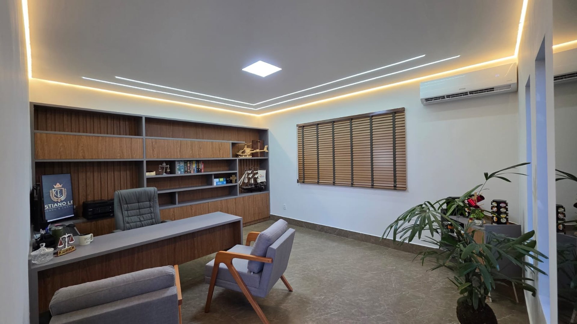 black and brown leather padded tub sofa