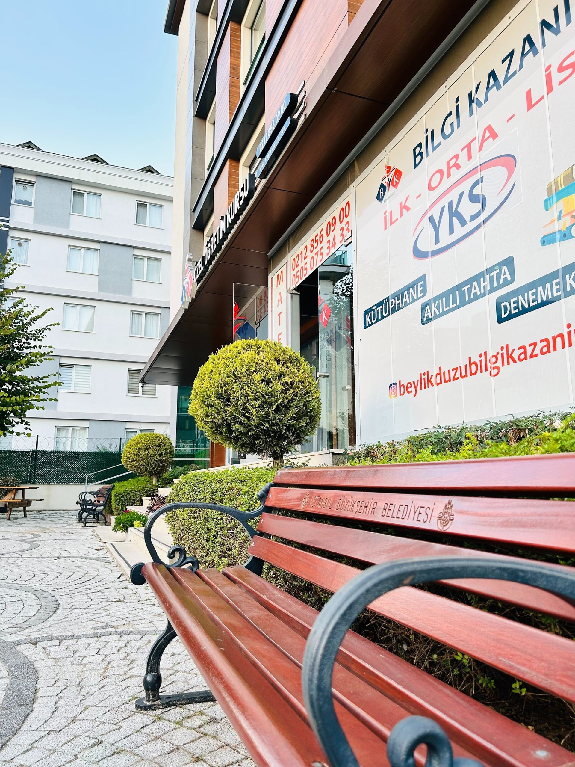 woman wearing yellow long-sleeved dress under white clouds and blue sky during daytime