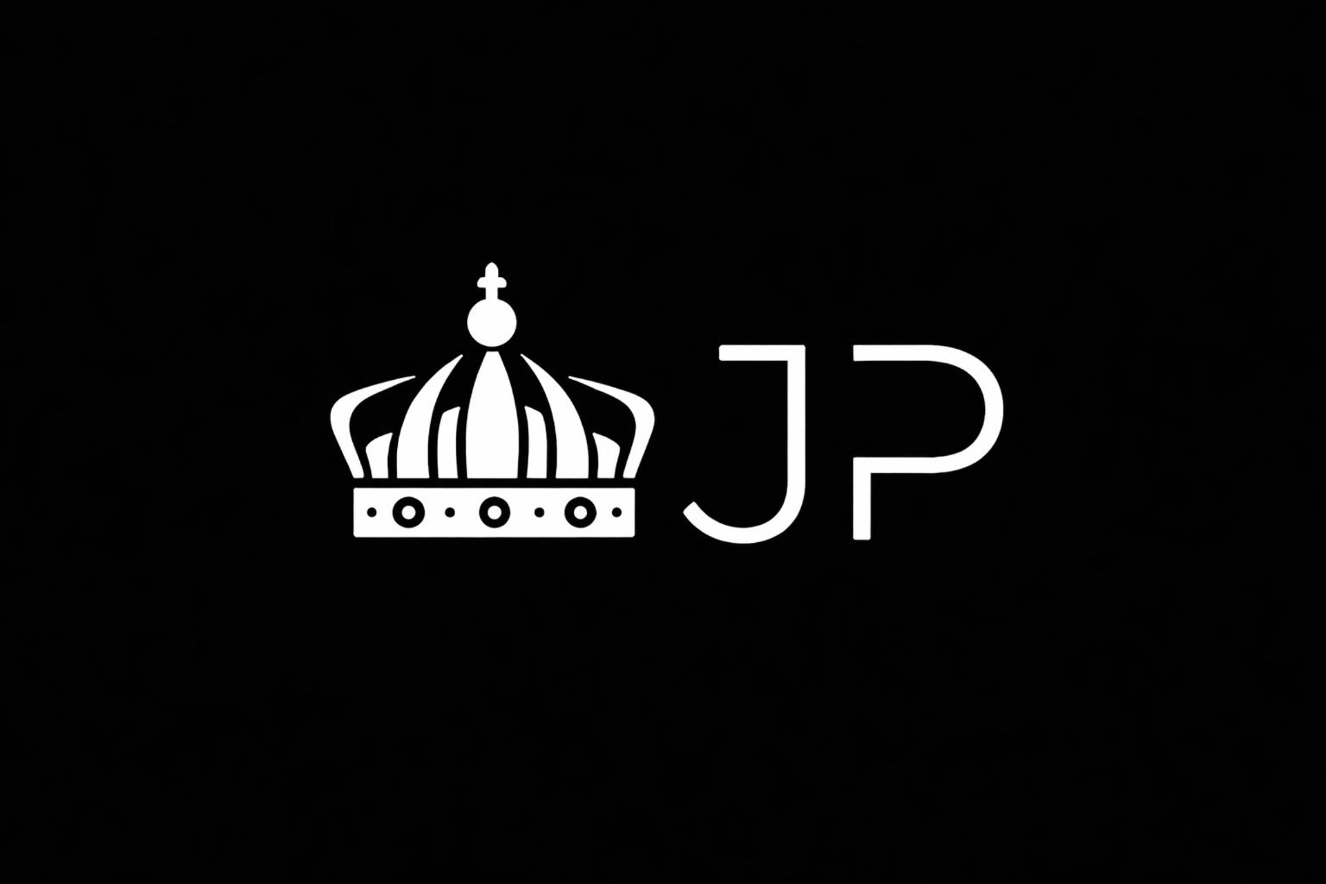 woman in black long sleeve shirt and blue denim jeans sitting on white concrete wall