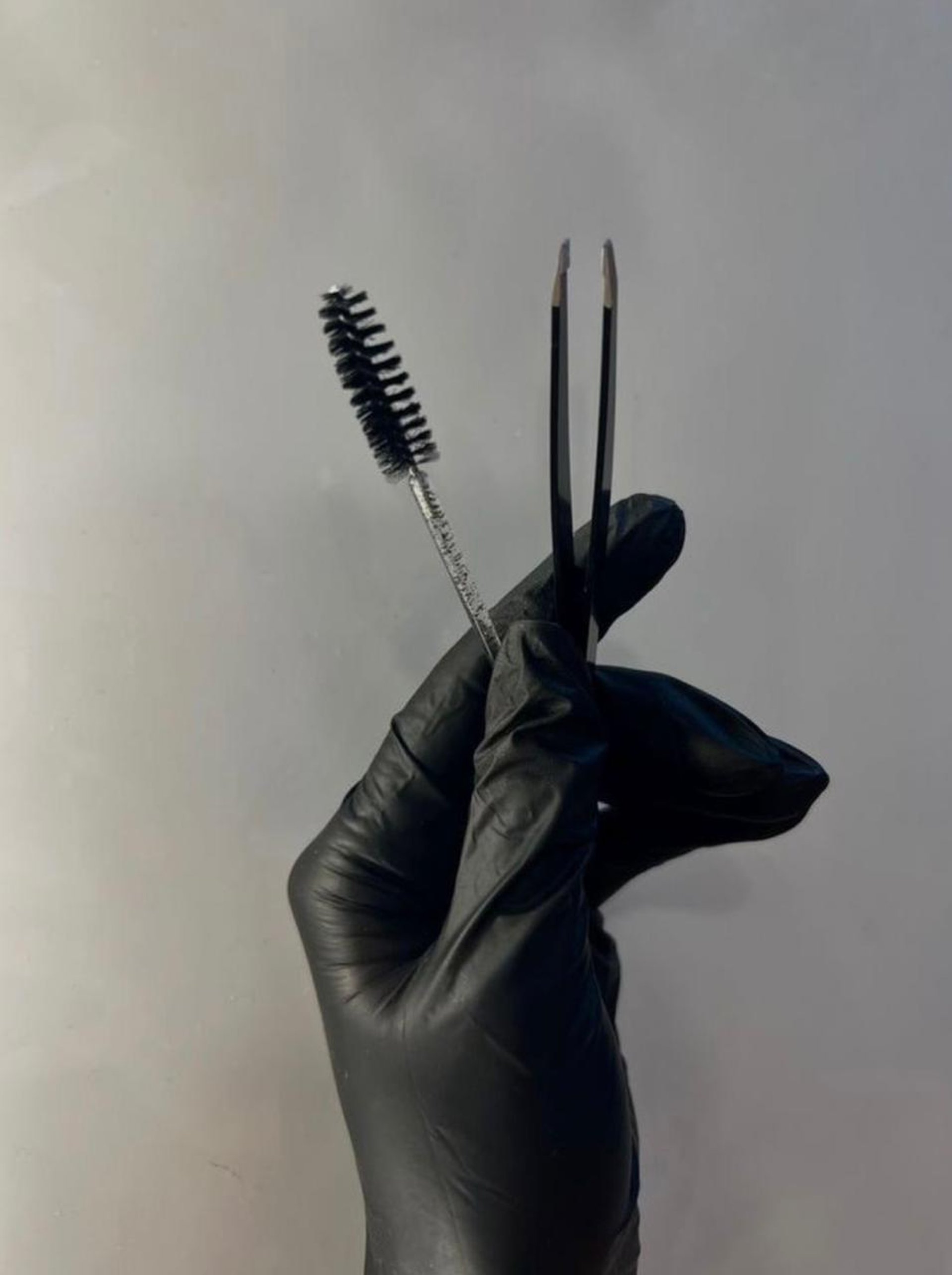 a close up of a surfboard on a wall