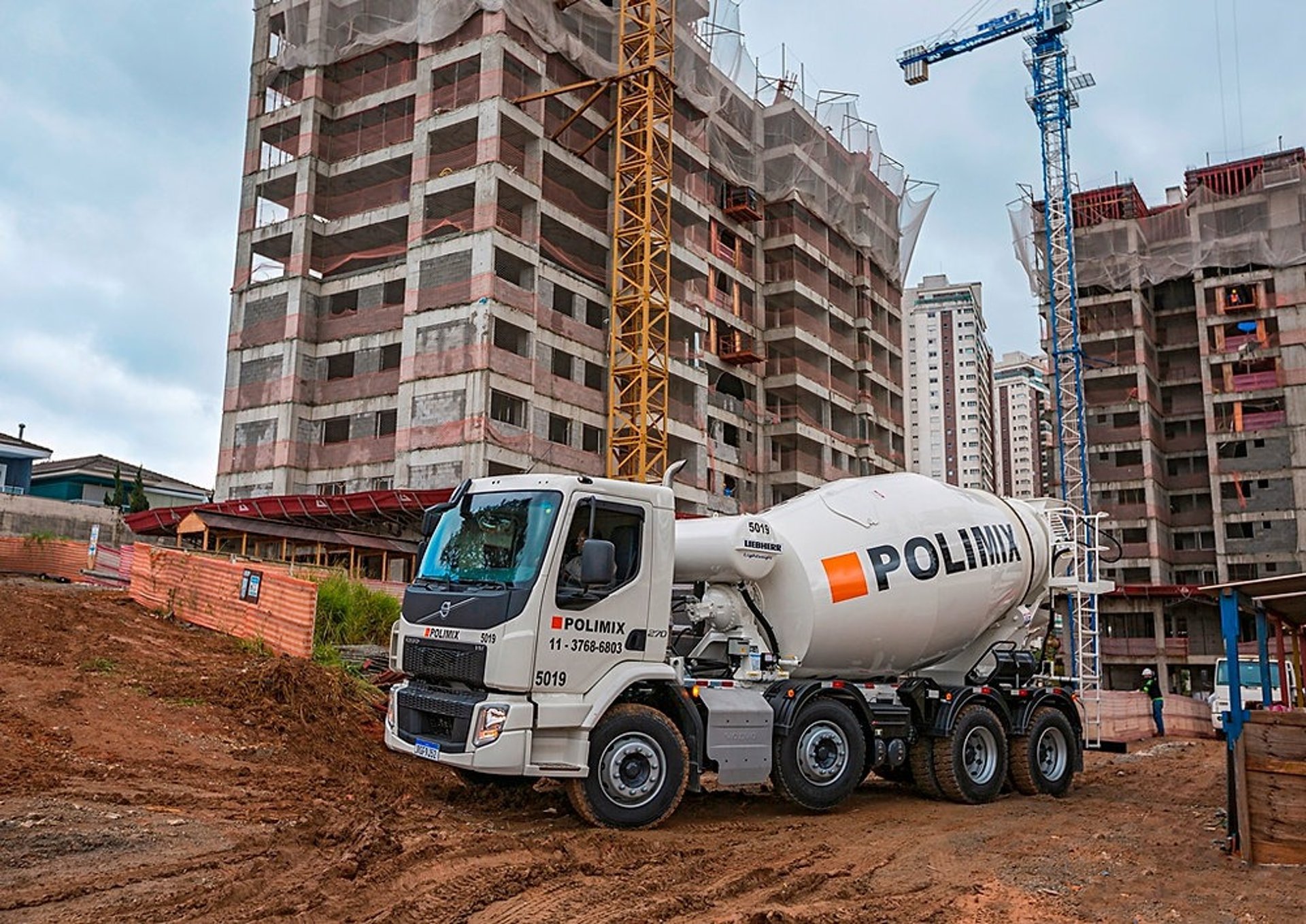black and brown leather padded tub sofa