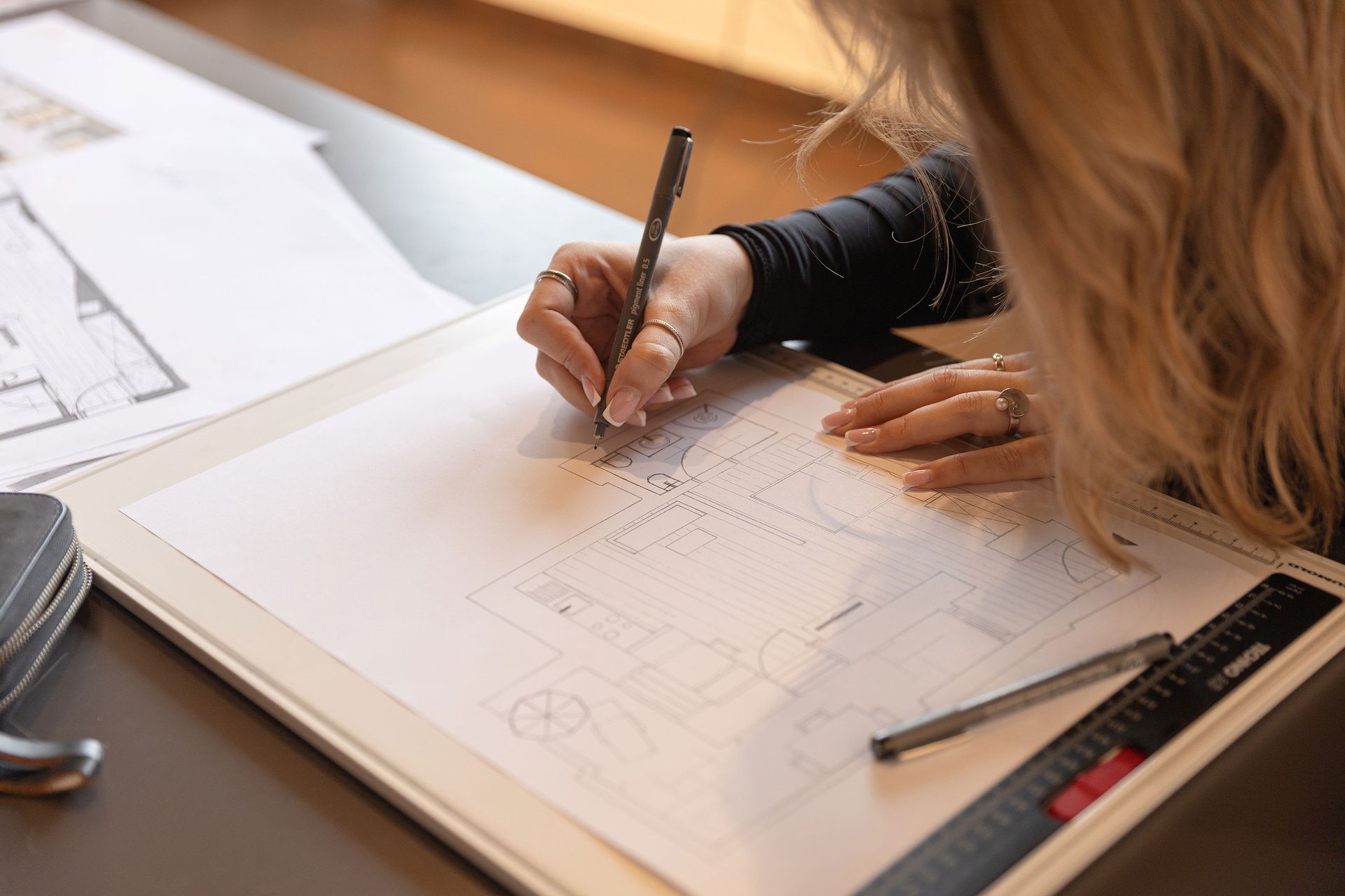 a close up of a black and brown abstract painting