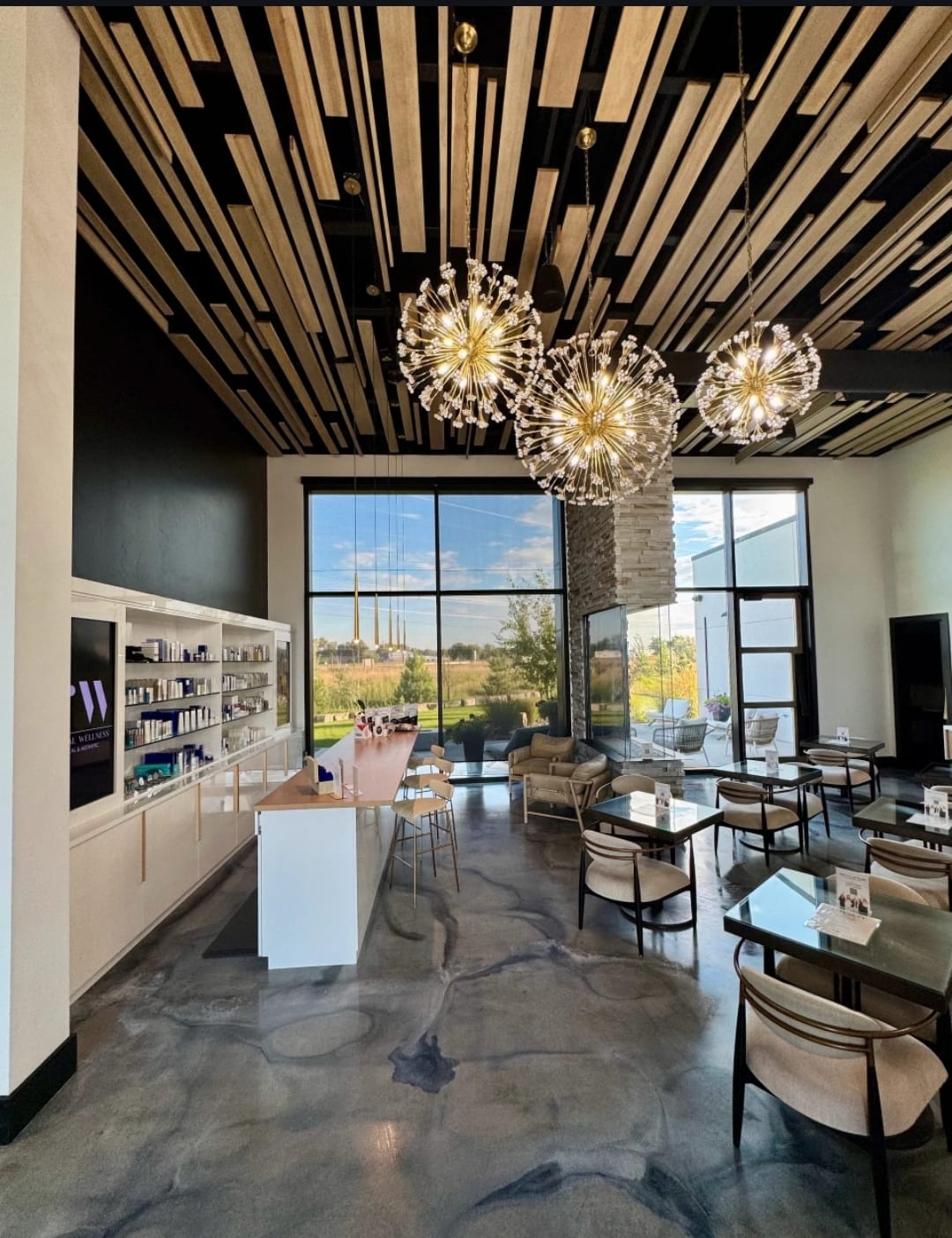 an abstract photo of a curved building with a blue sky in the background