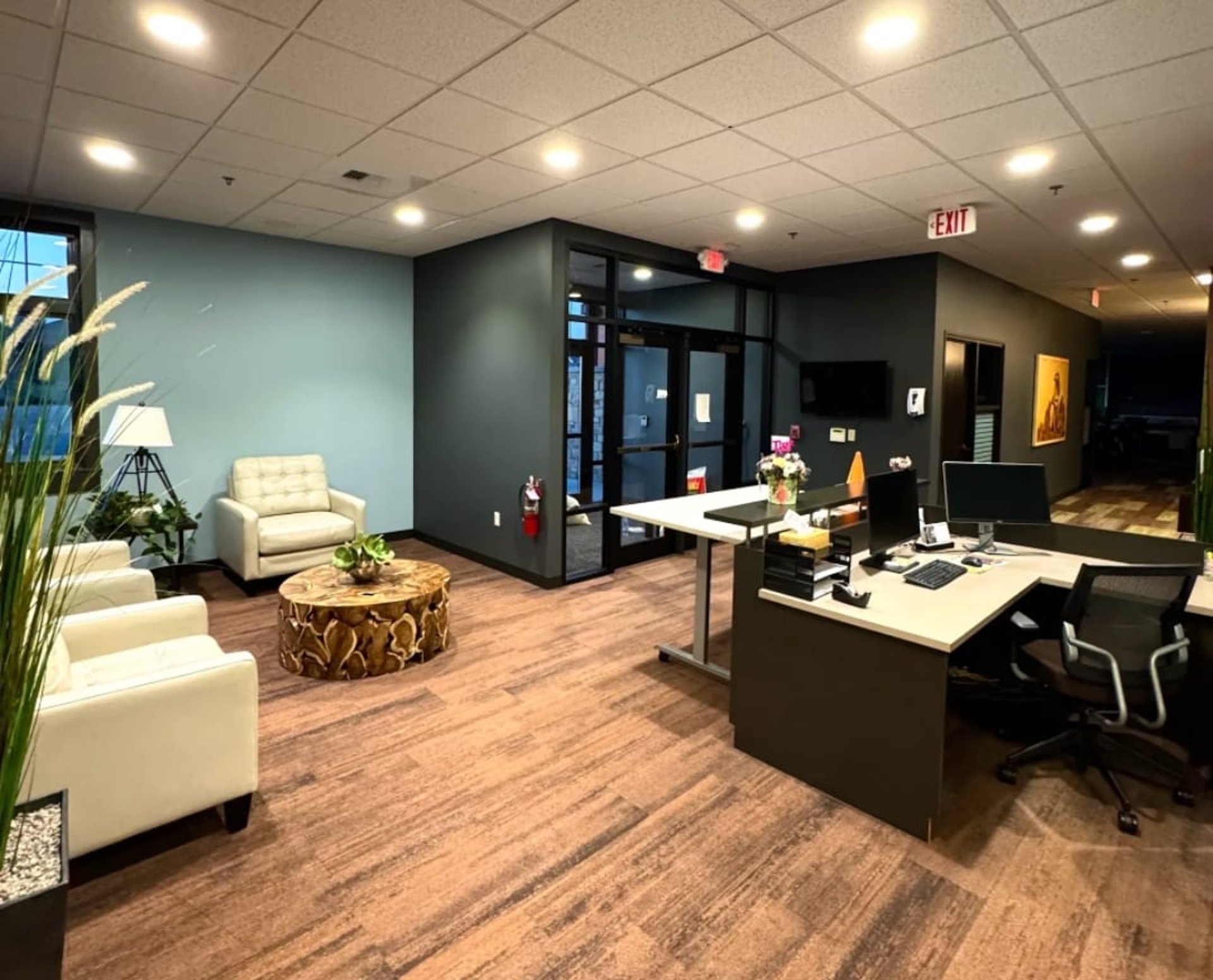 an abstract photo of a curved building with a blue sky in the background