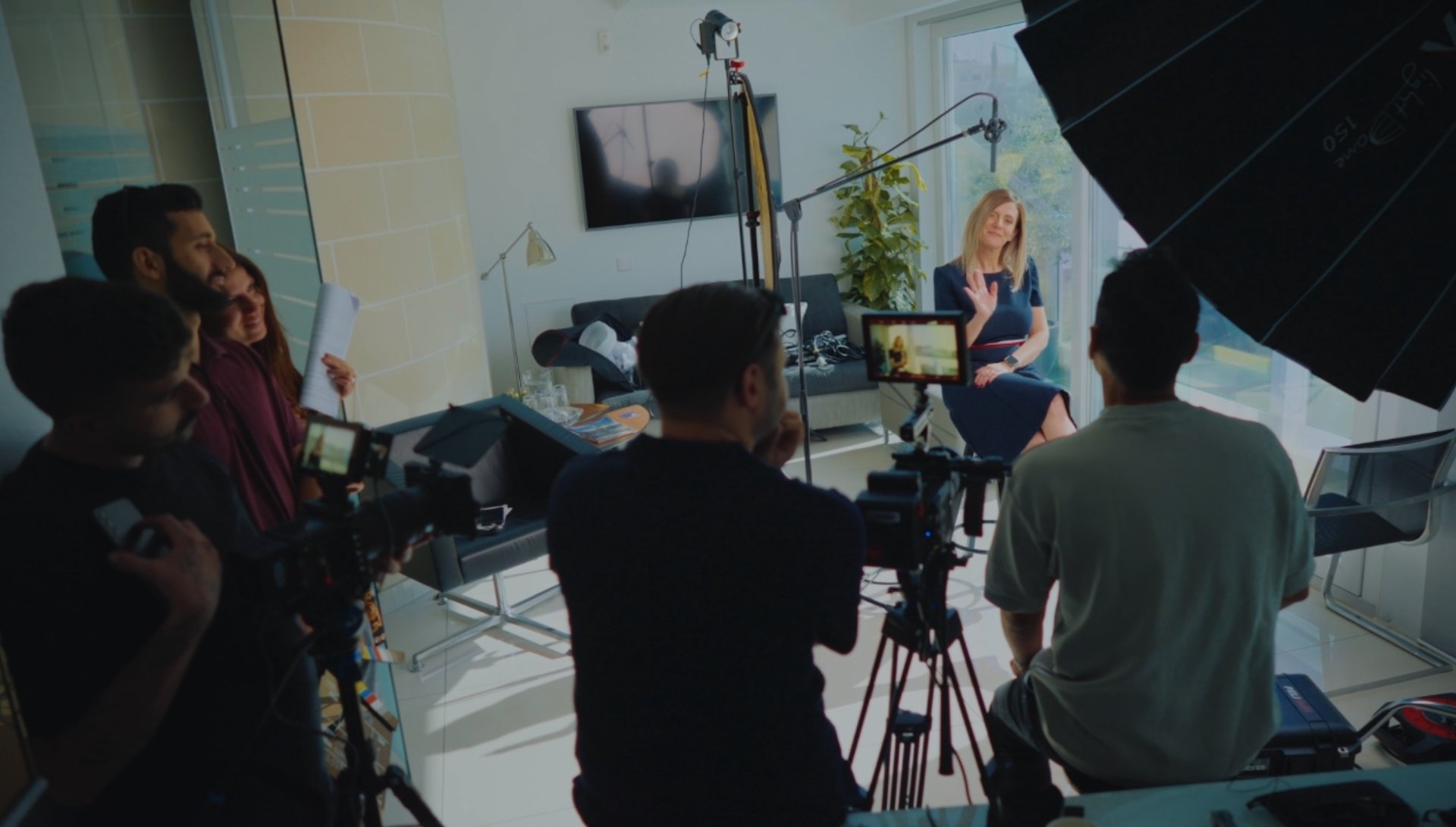 woman wearing yellow long-sleeved dress under white clouds and blue sky during daytime