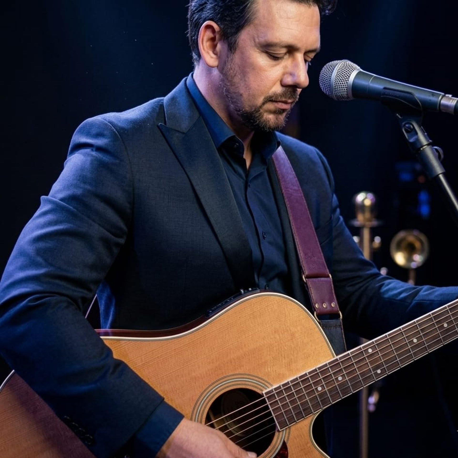 an abstract photo of a curved building with a blue sky in the background