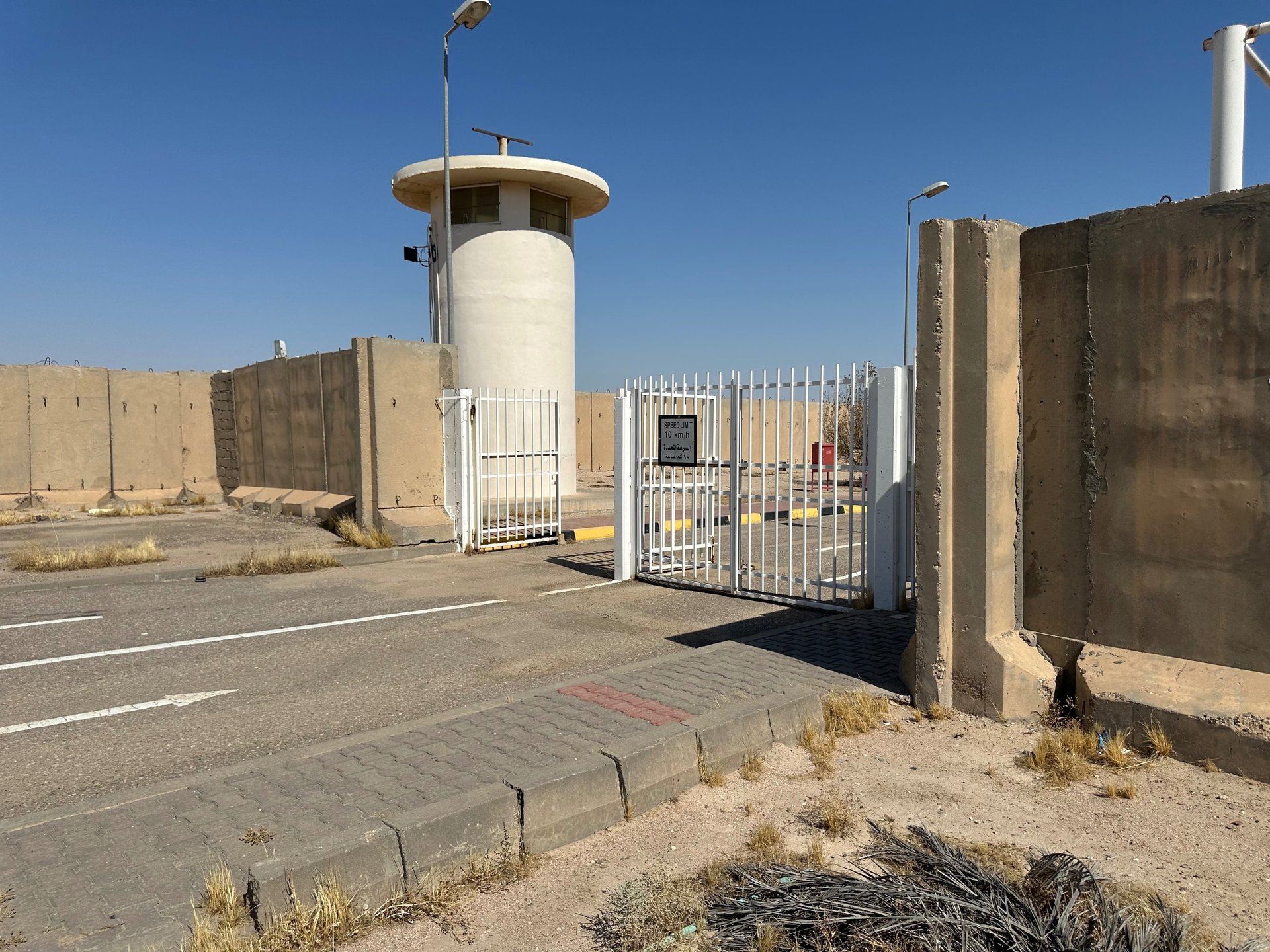 people sitting on chair in front of table while holding pens during daytime
