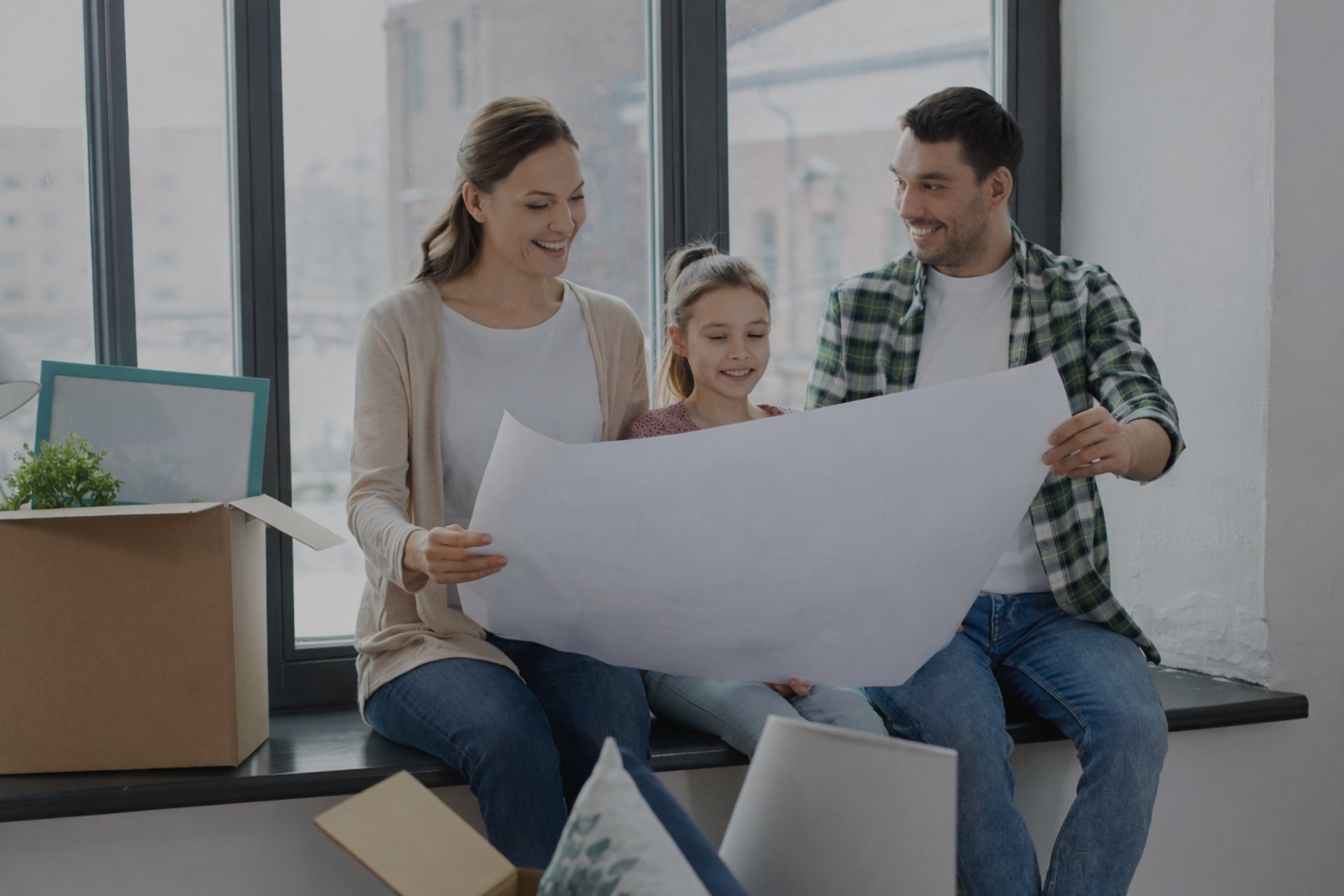 Modern living room with large windows and comfortable seating