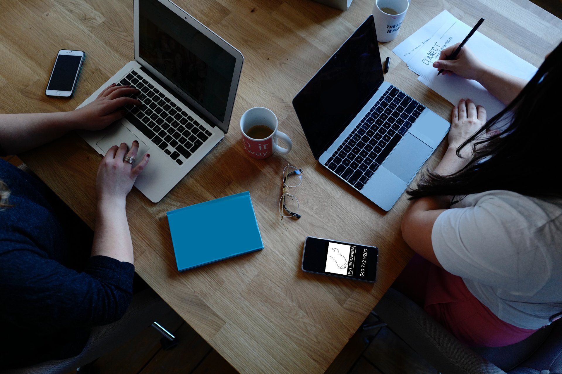 person holding white Android smartphone in white shirt