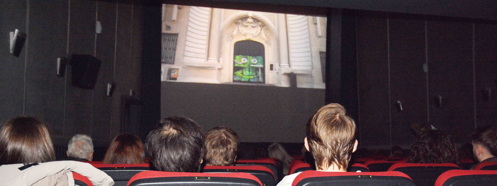 a city street filled with lots of traffic