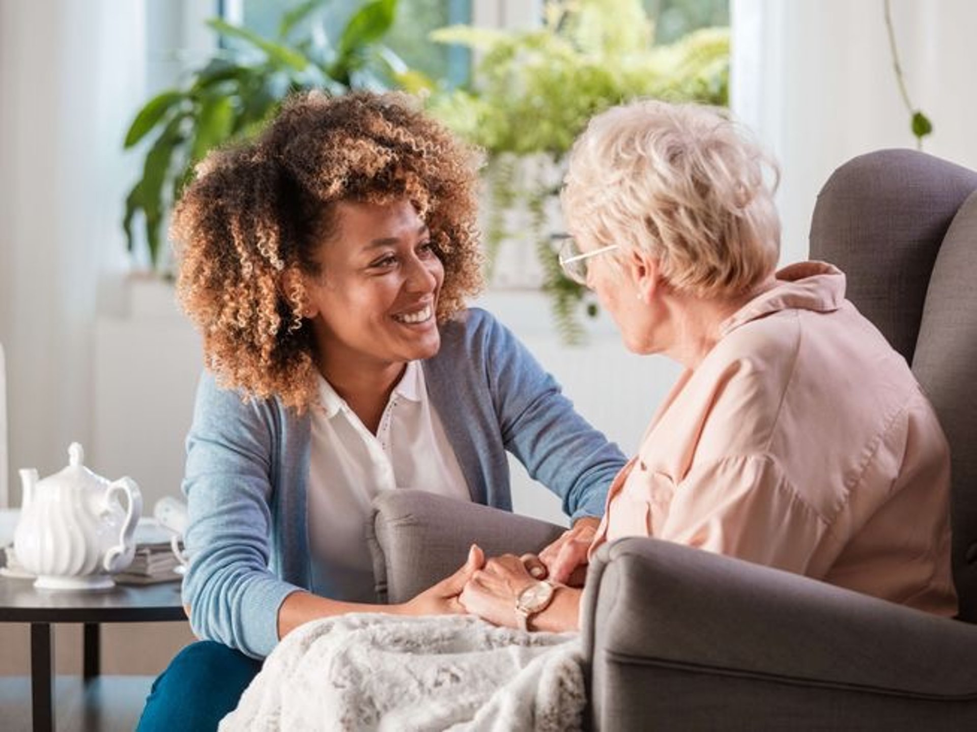 black and brown leather padded tub sofa