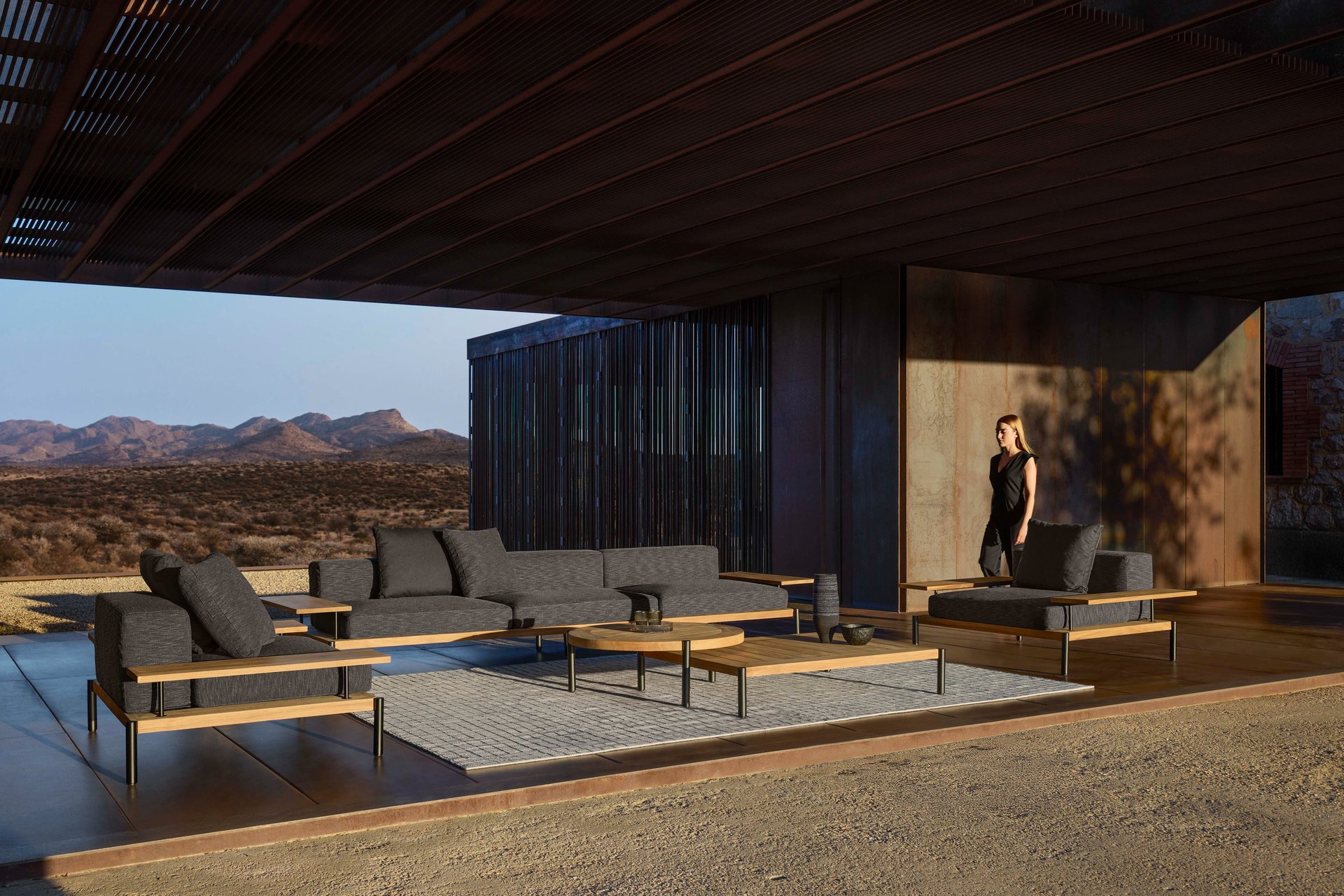 an abstract photo of a curved building with a blue sky in the background