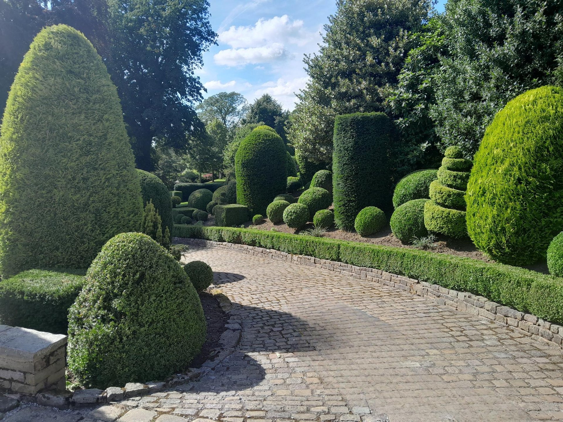 black and brown leather padded tub sofa