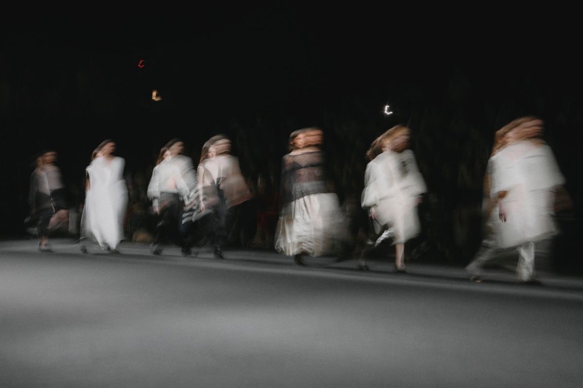 woman holding dried flower