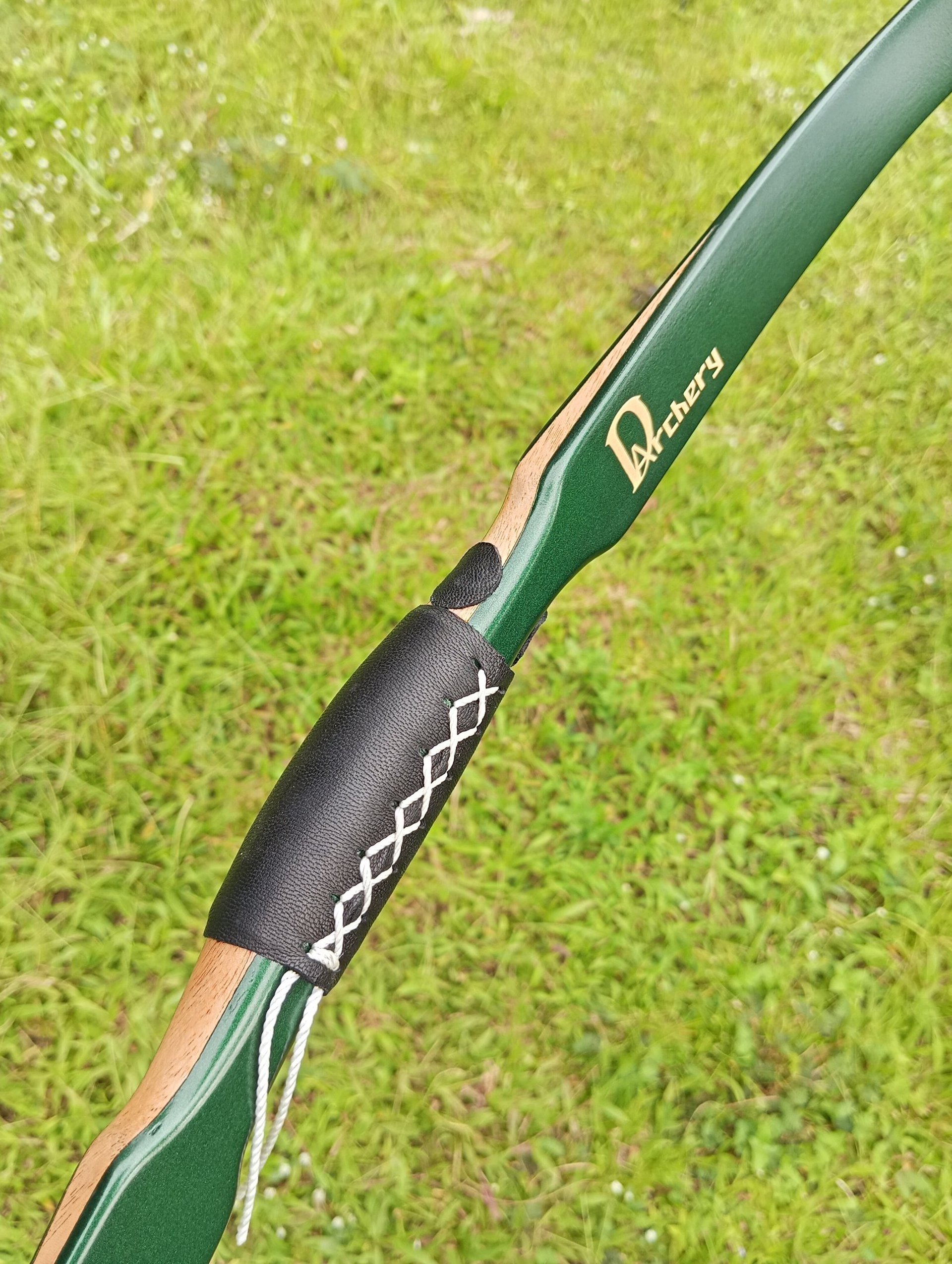 a colorful rope on a wooden deck