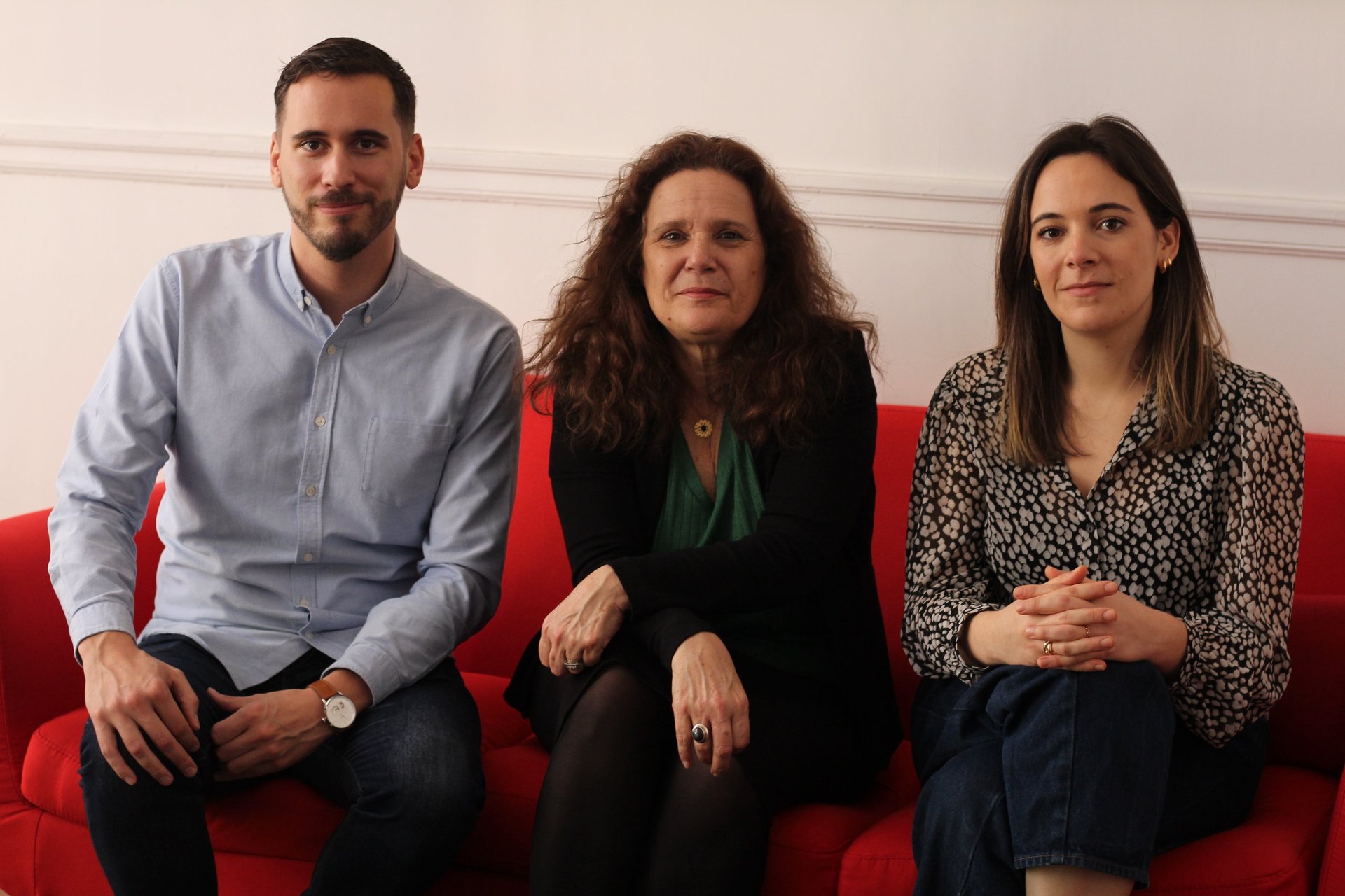 an abstract photo of a curved building with a blue sky in the background