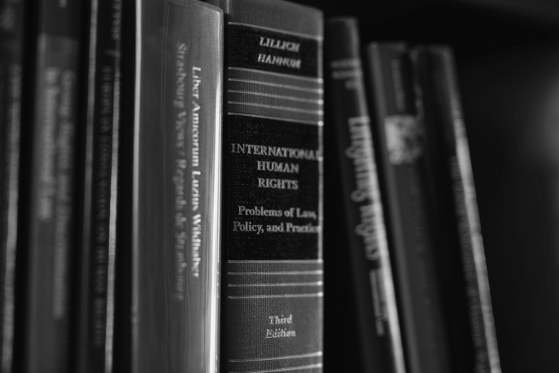 an abstract photo of a curved building with a blue sky in the background