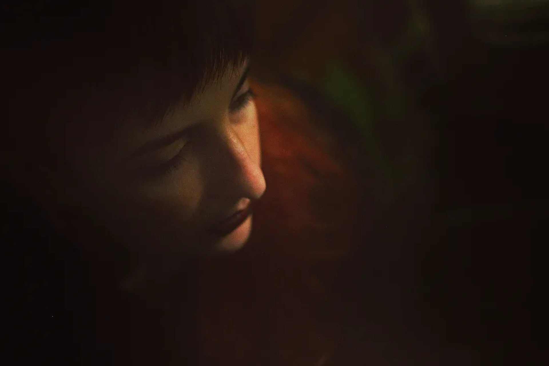 a close up of a black and brown abstract painting