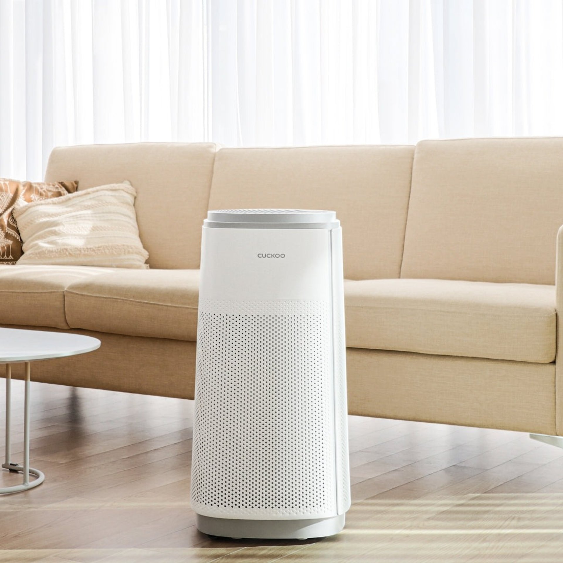 an abstract photo of a curved building with a blue sky in the background