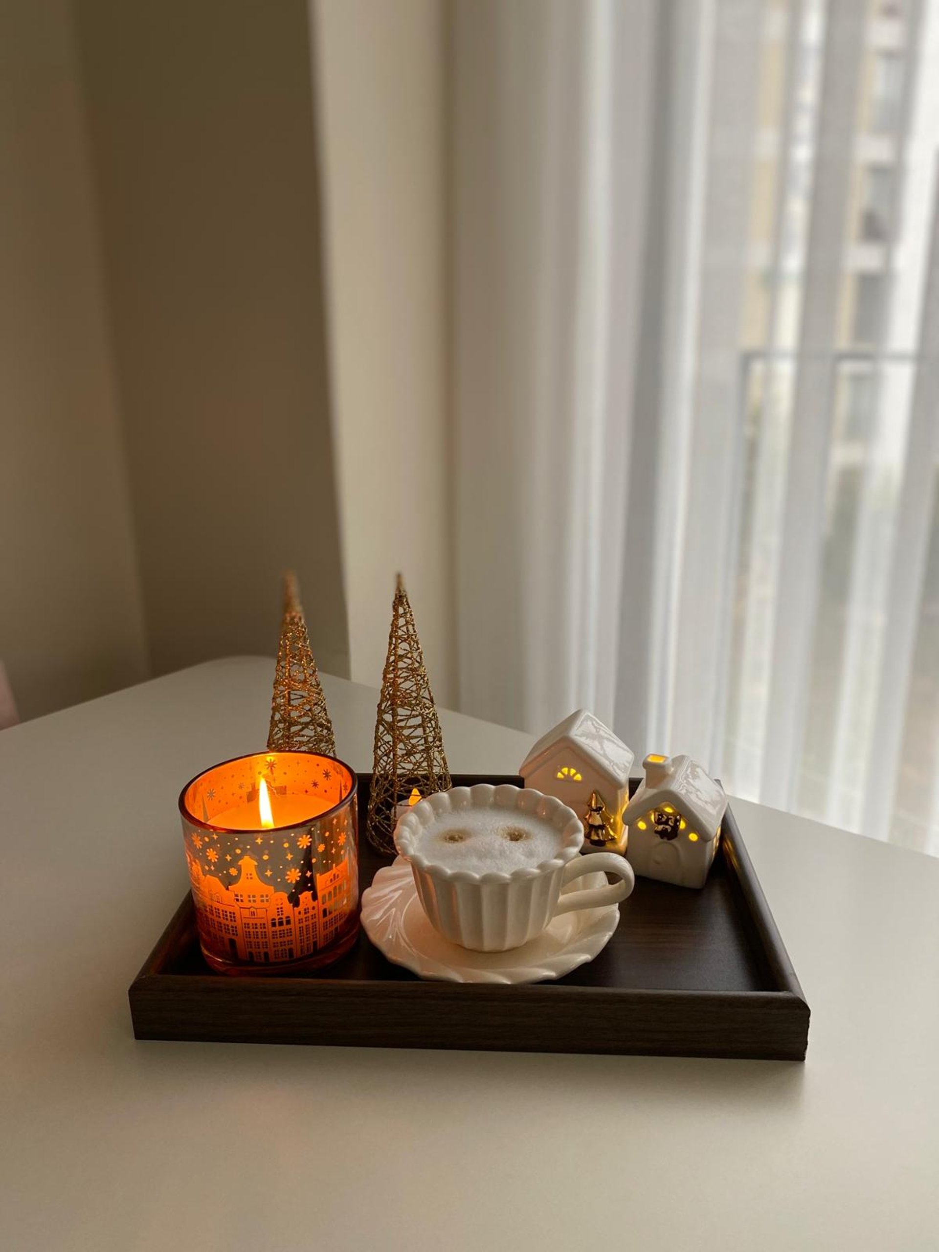 white ceramic mug with brown liquid