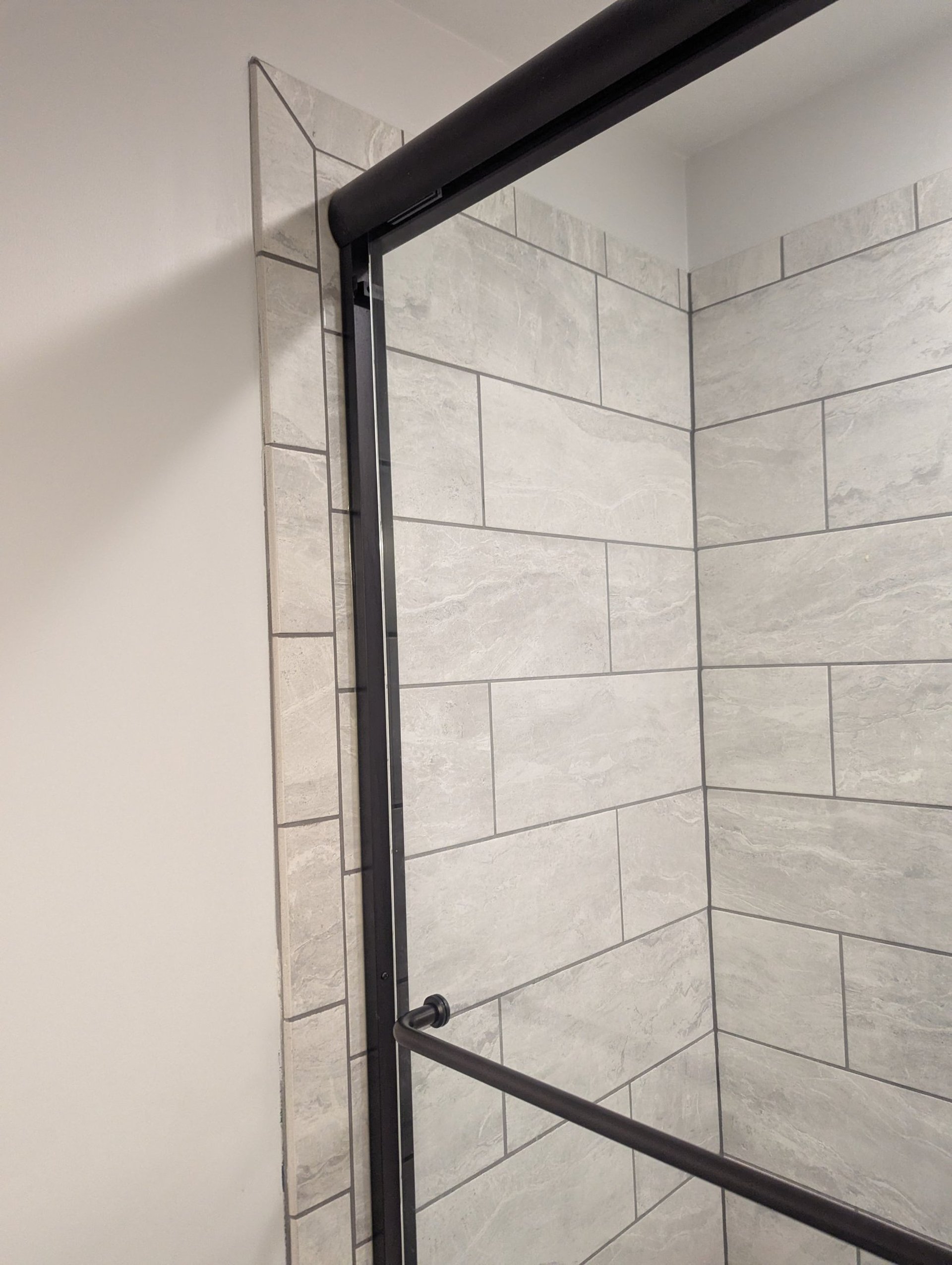 an abstract photo of a curved building with a blue sky in the background