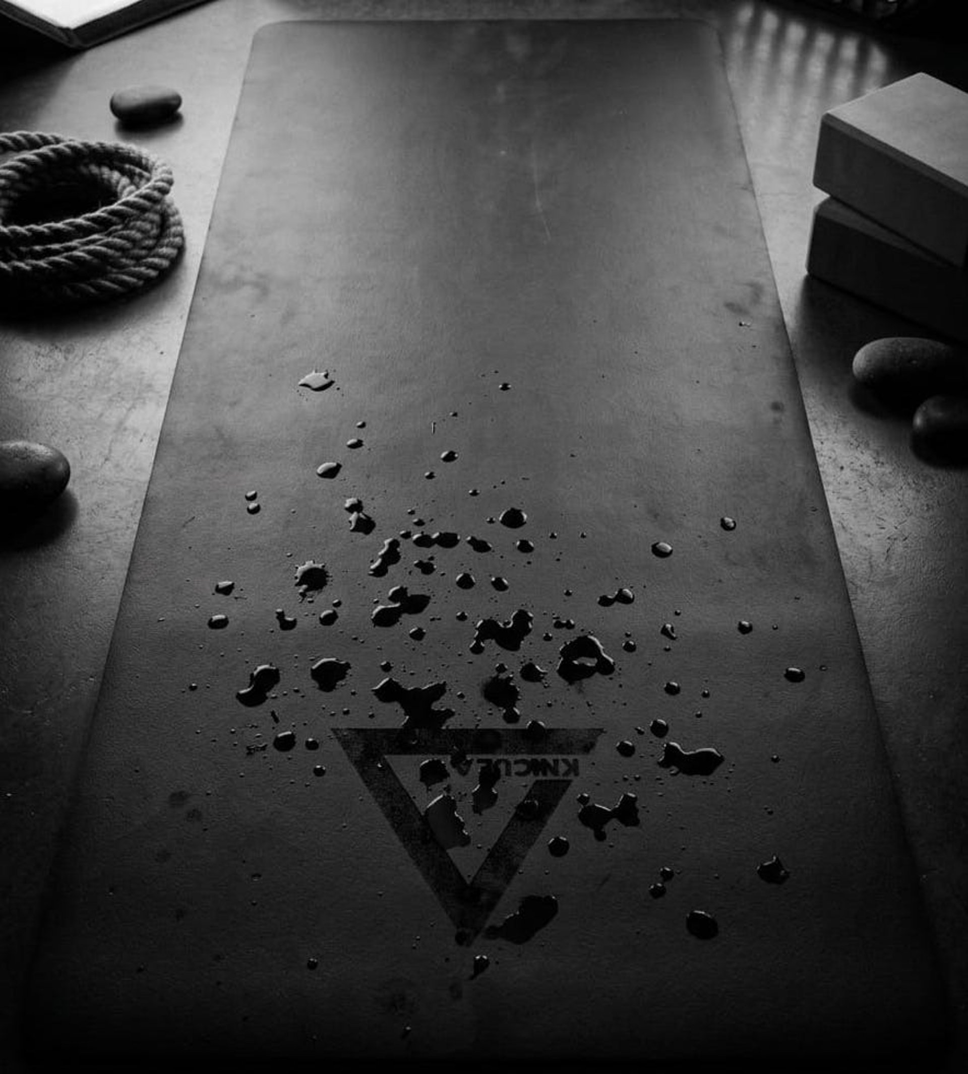 a black and white photo of a white wall