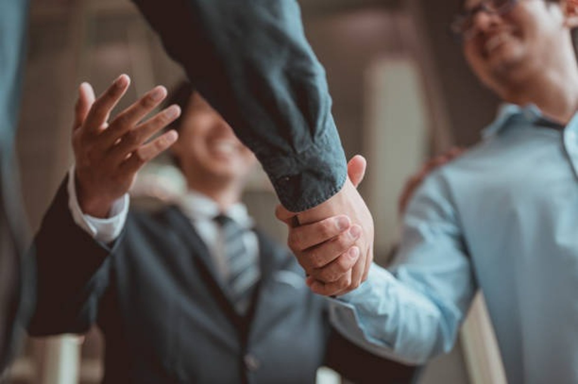 an abstract photo of a curved building with a blue sky in the background