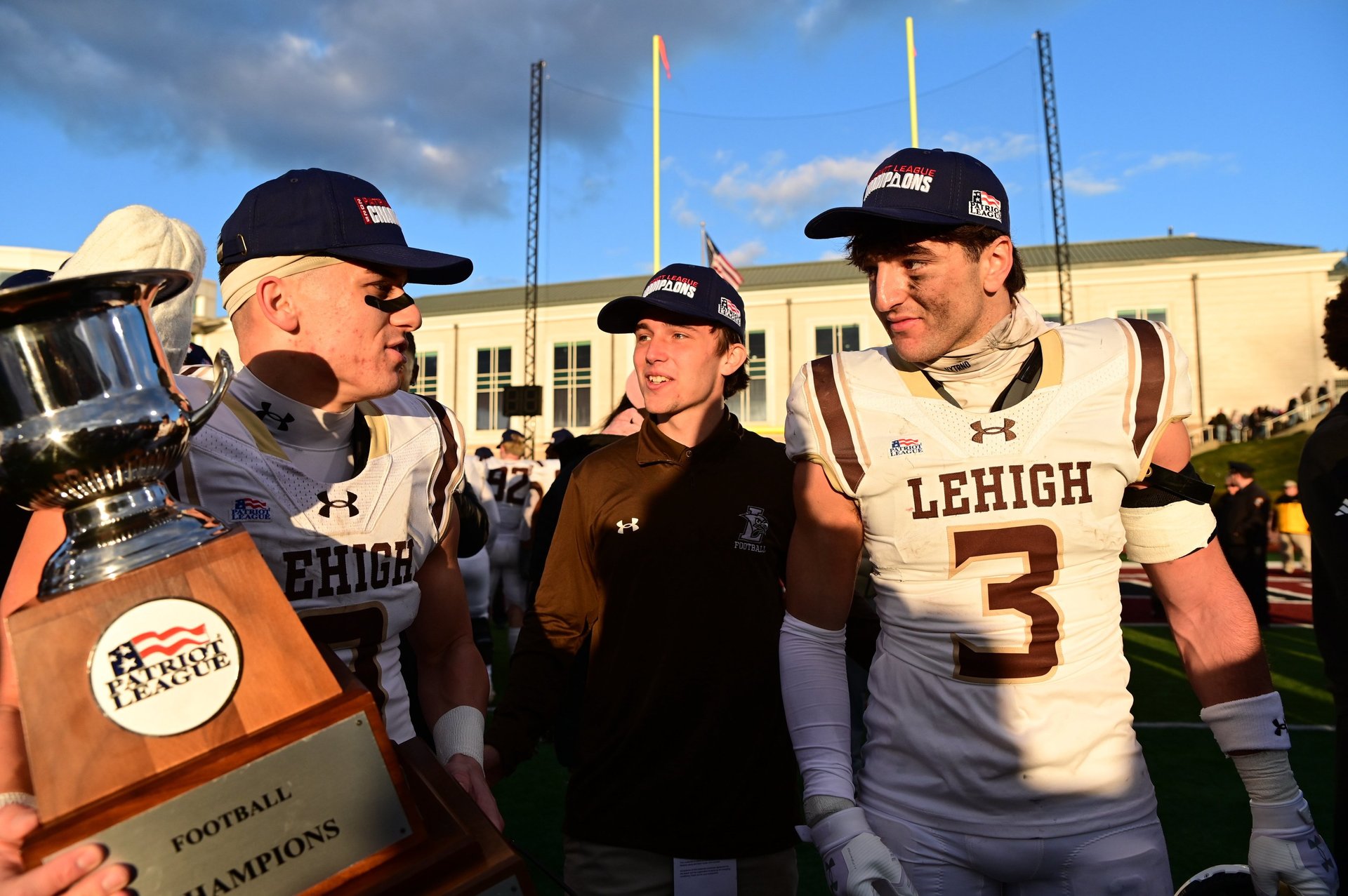 black and brown leather padded tub sofa