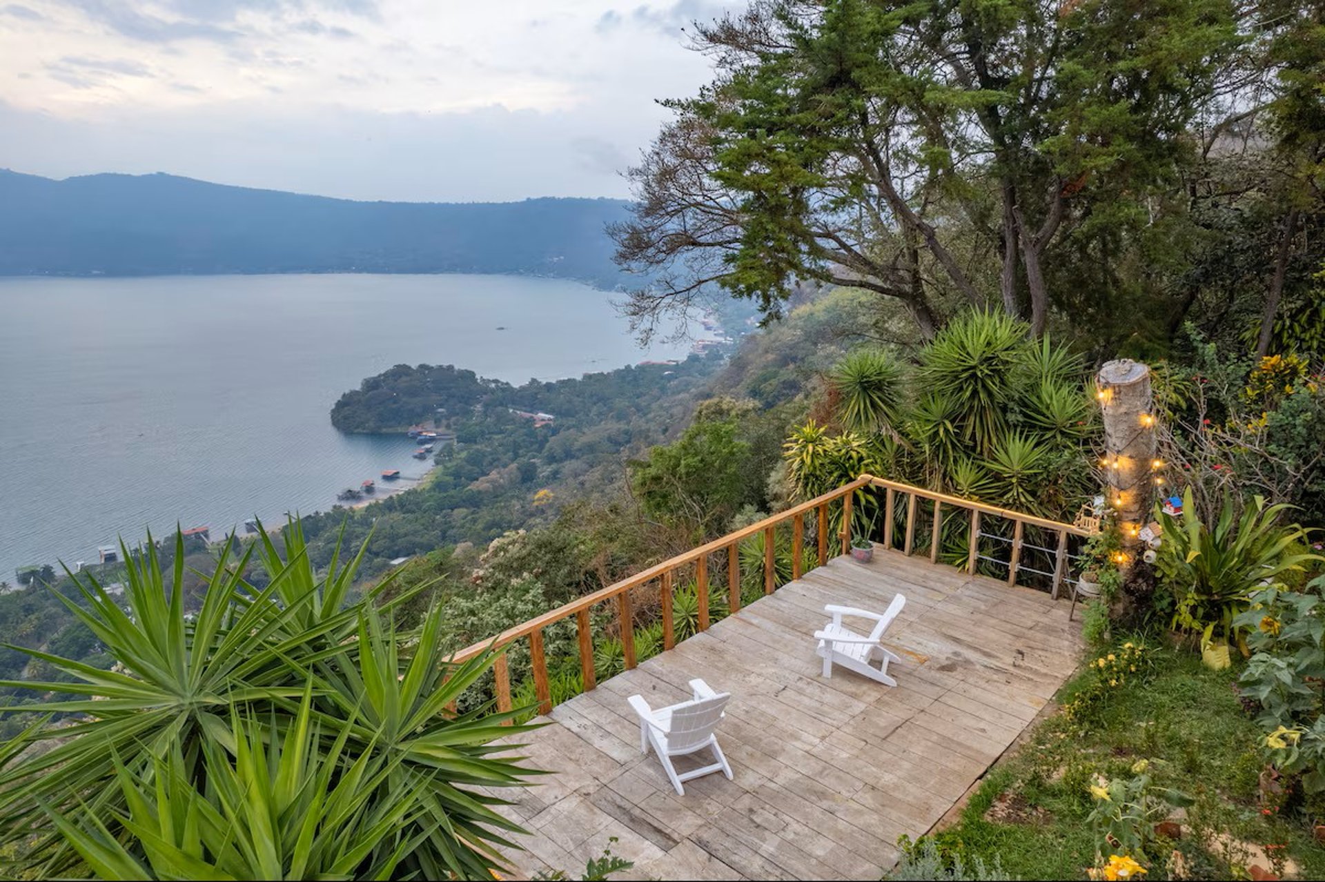 brown wooden house on lake