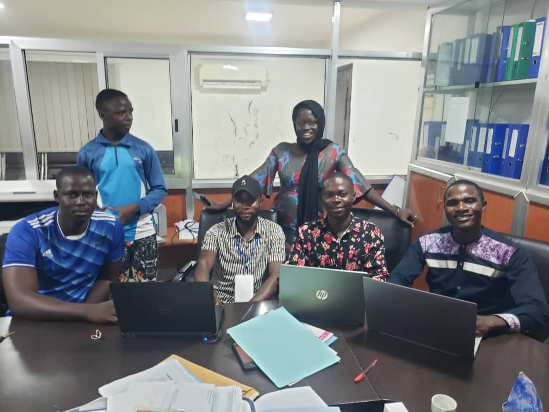 woman wearing yellow long-sleeved dress under white clouds and blue sky during daytime