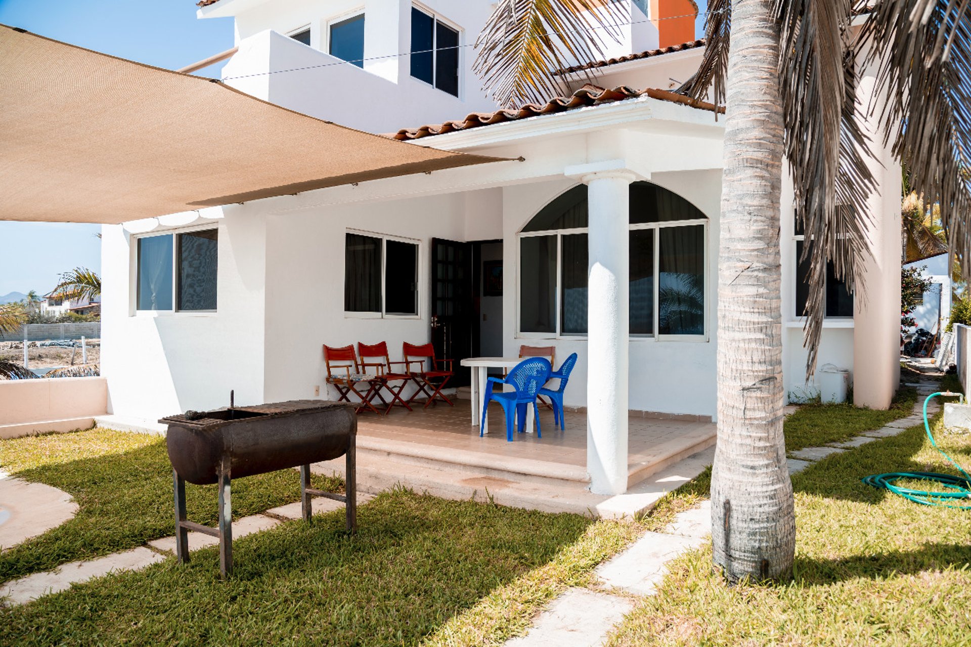 black and brown leather padded tub sofa