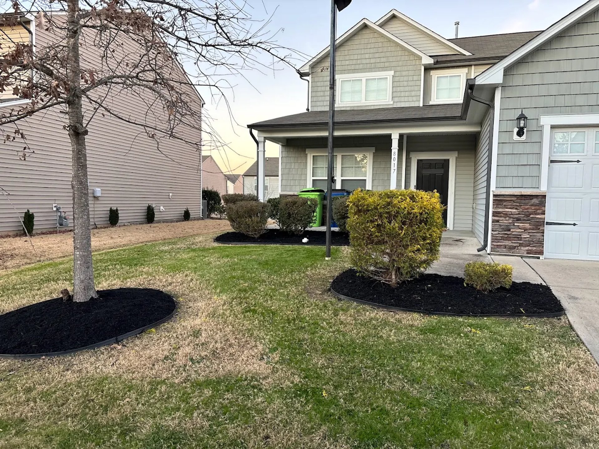 black and brown leather padded tub sofa