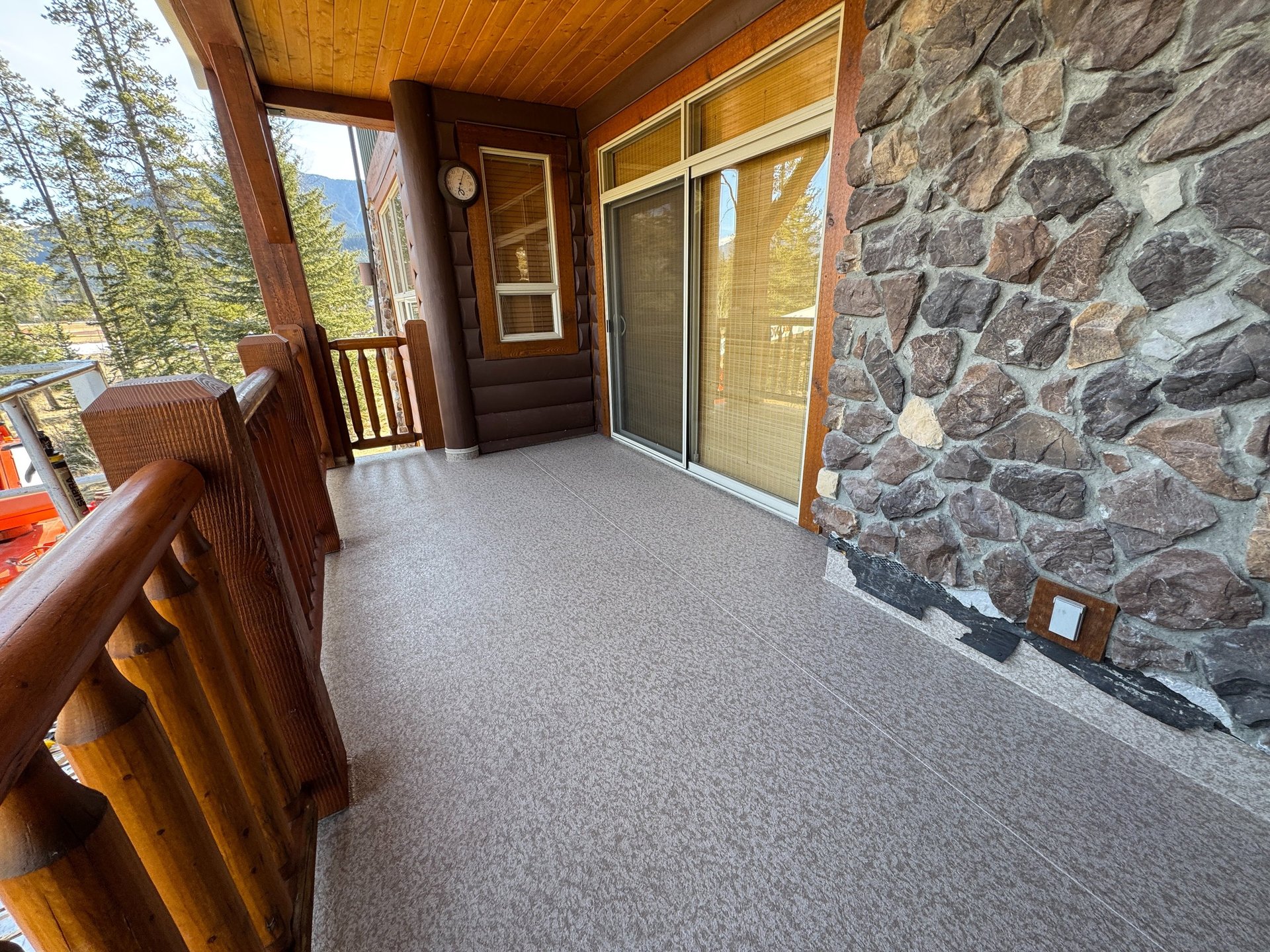 an abstract photo of a curved building with a blue sky in the background