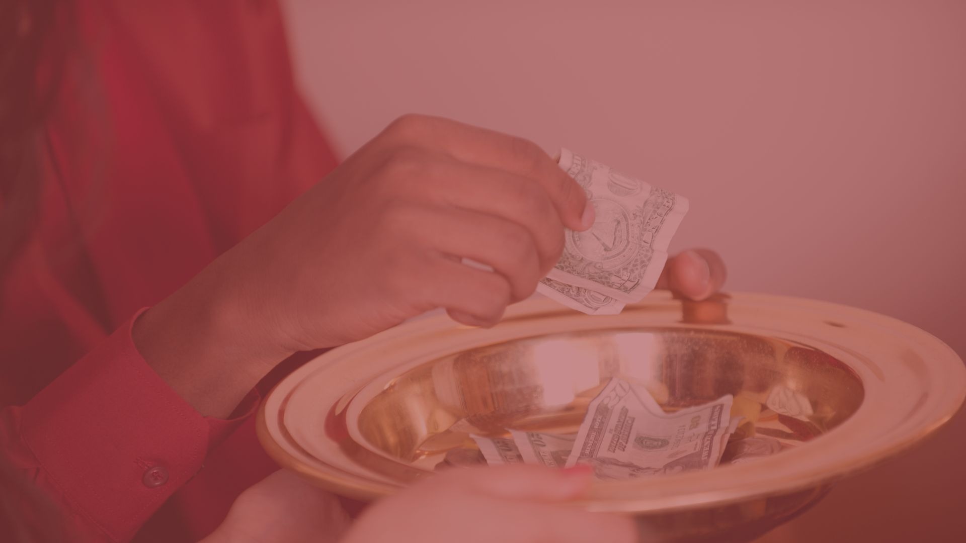 an abstract photo of a curved building with a blue sky in the background