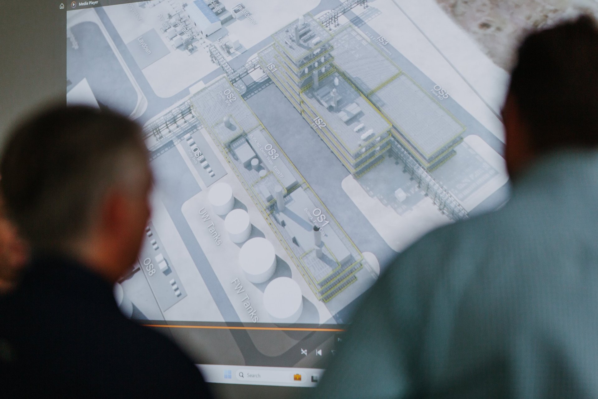 A helicopter and airplane fly in the sky.