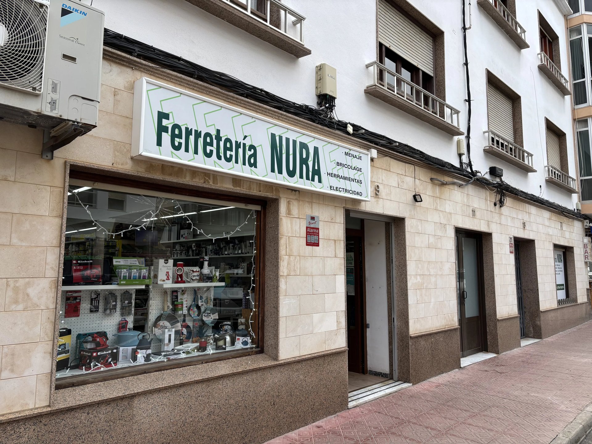woman wearing yellow long-sleeved dress under white clouds and blue sky during daytime