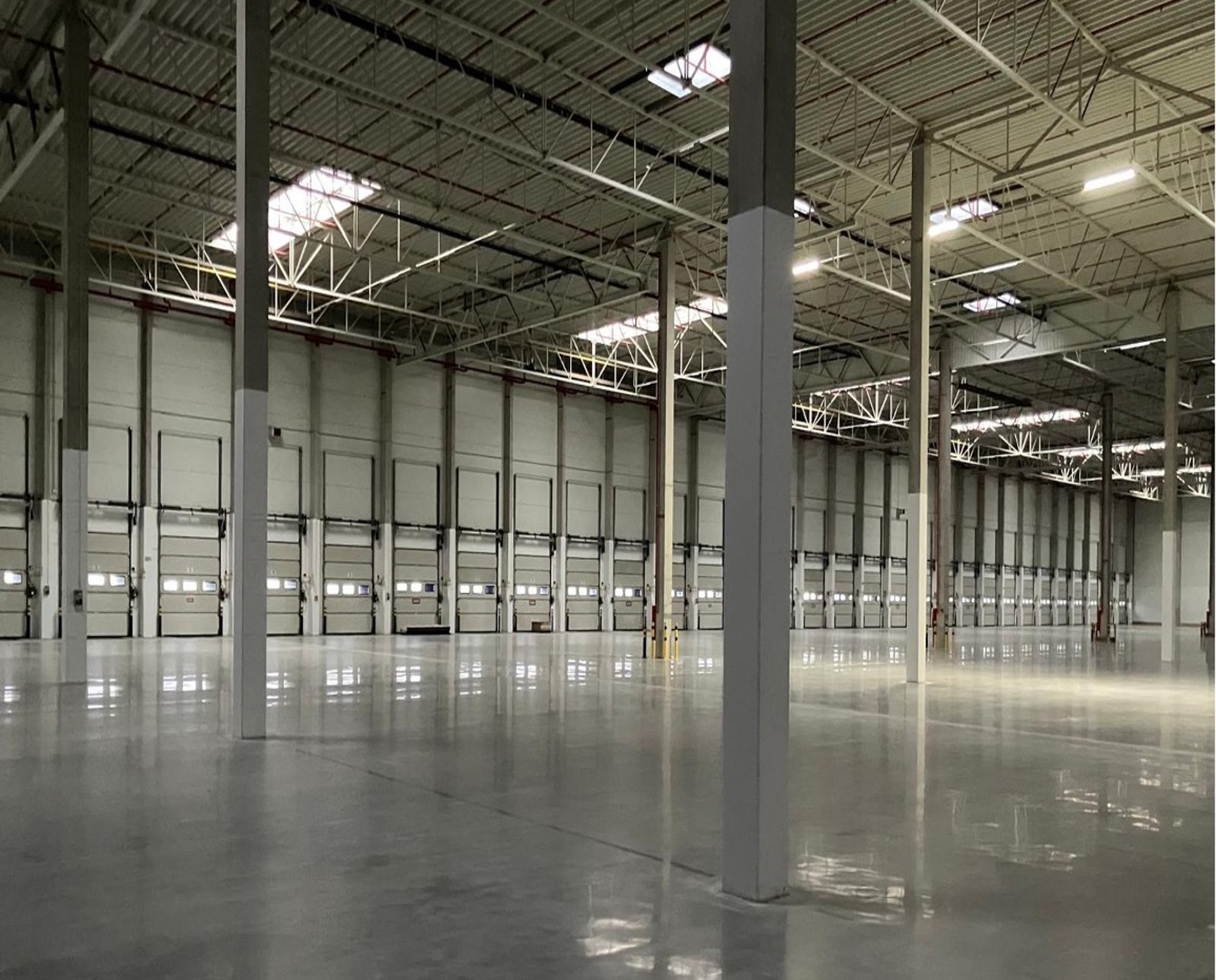 black and brown leather padded tub sofa