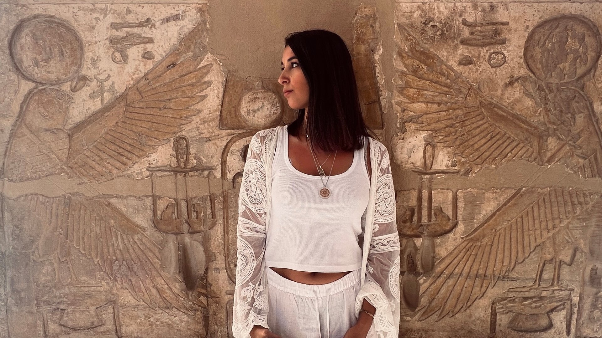 a black and white photo of a white wall