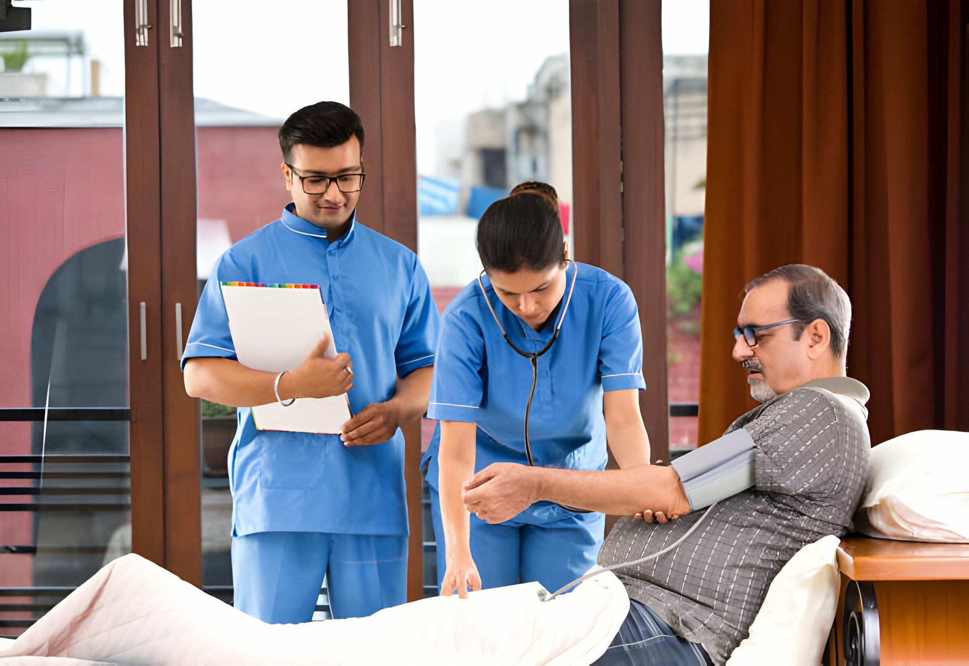Doctor checks patient's blood pressure with stethoscope.