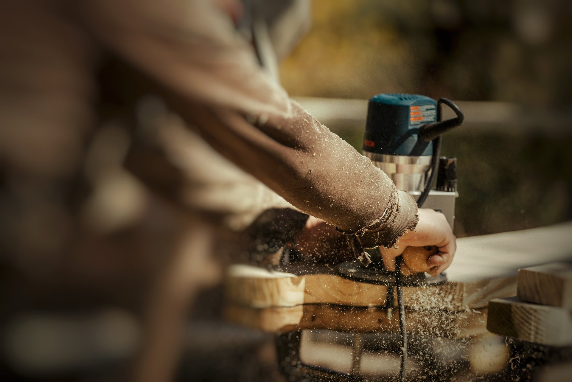a man on a scaffold working on a building
