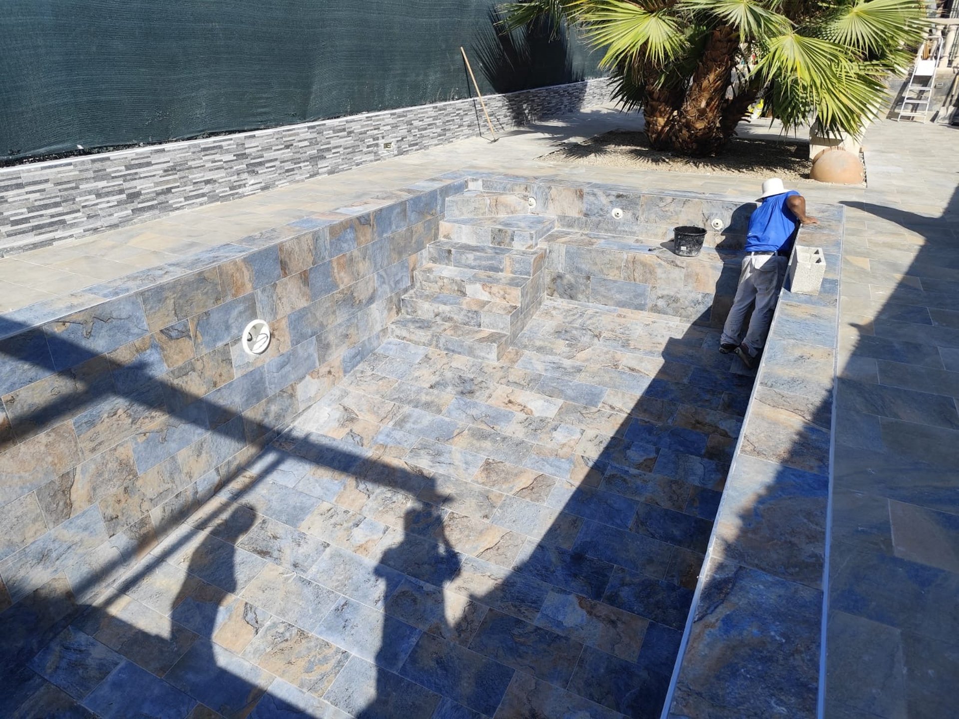 woman wearing yellow long-sleeved dress under white clouds and blue sky during daytime