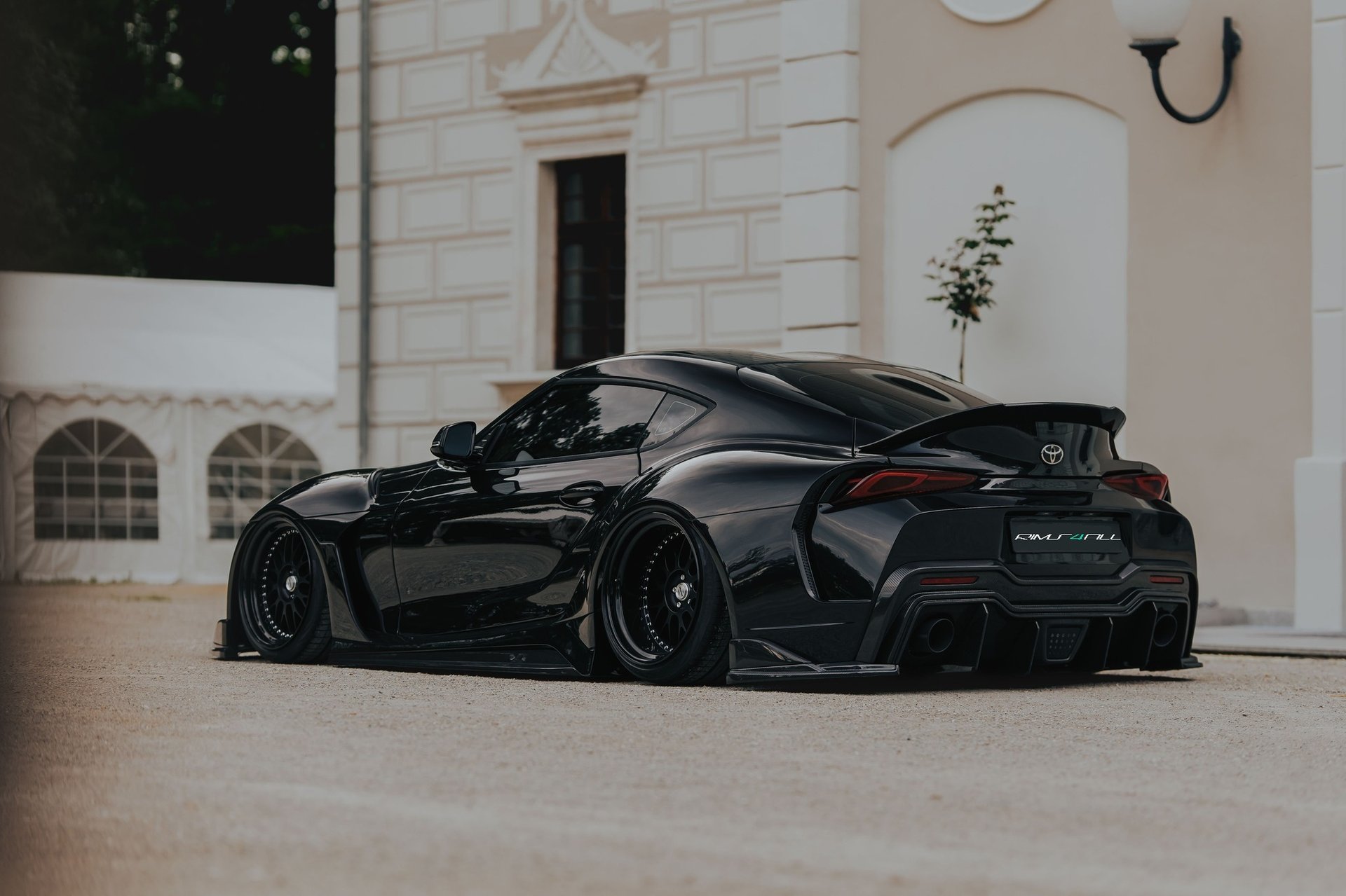 a close up of a black and brown abstract painting