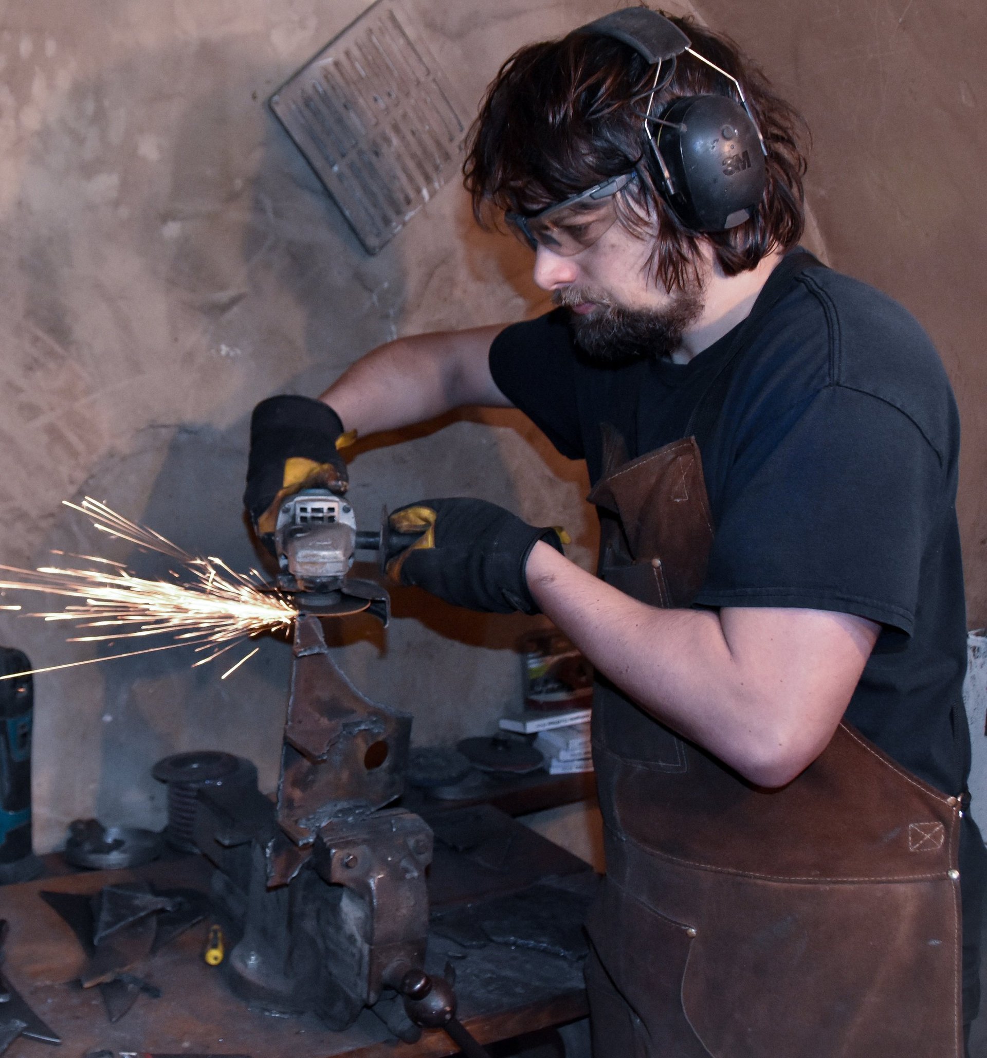 an abstract photo of a curved building with a blue sky in the background