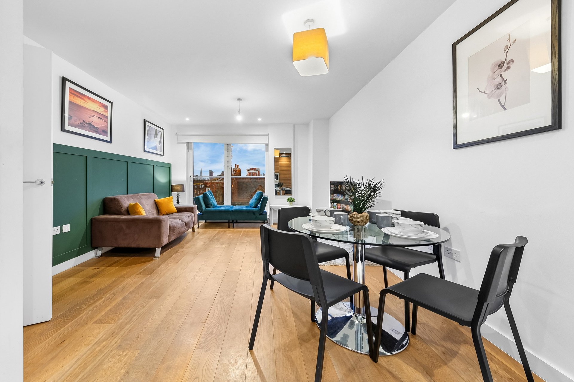 black and brown leather padded tub sofa