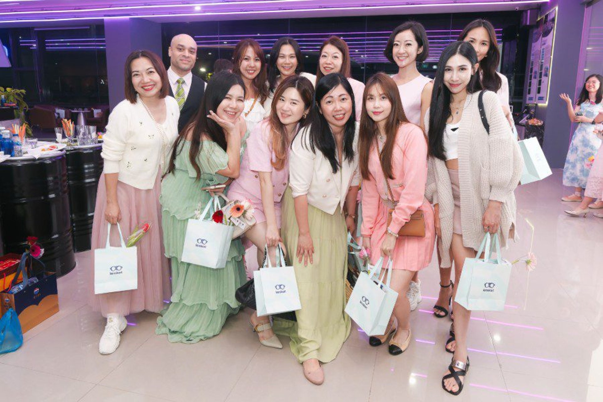an abstract photo of a curved building with a blue sky in the background