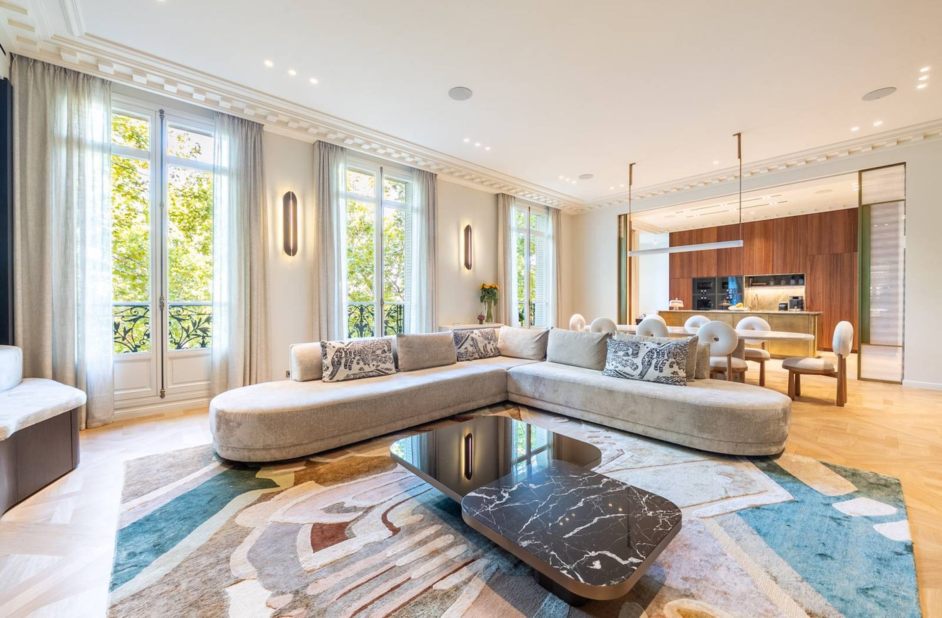 an abstract photo of a curved building with a blue sky in the background