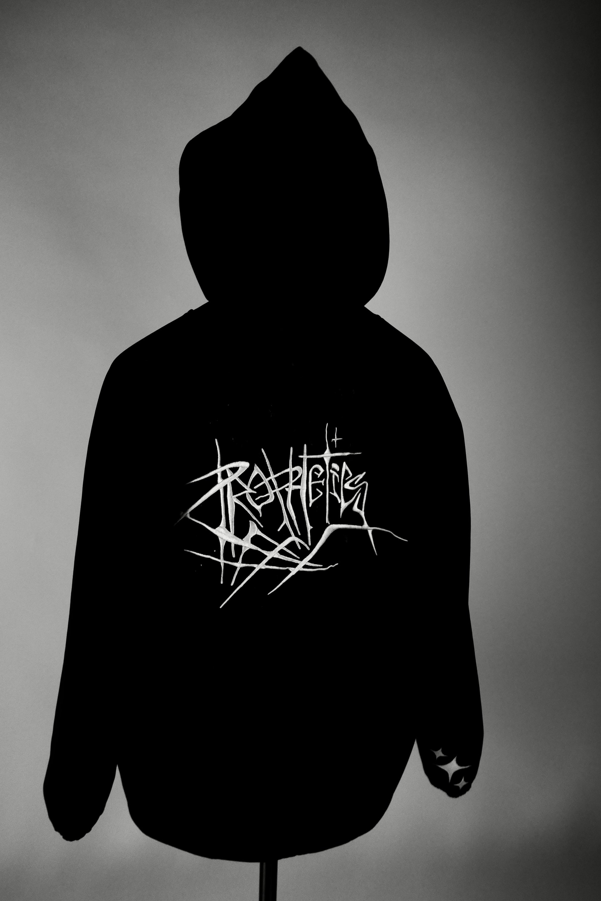 an abstract photo of a curved building with a blue sky in the background