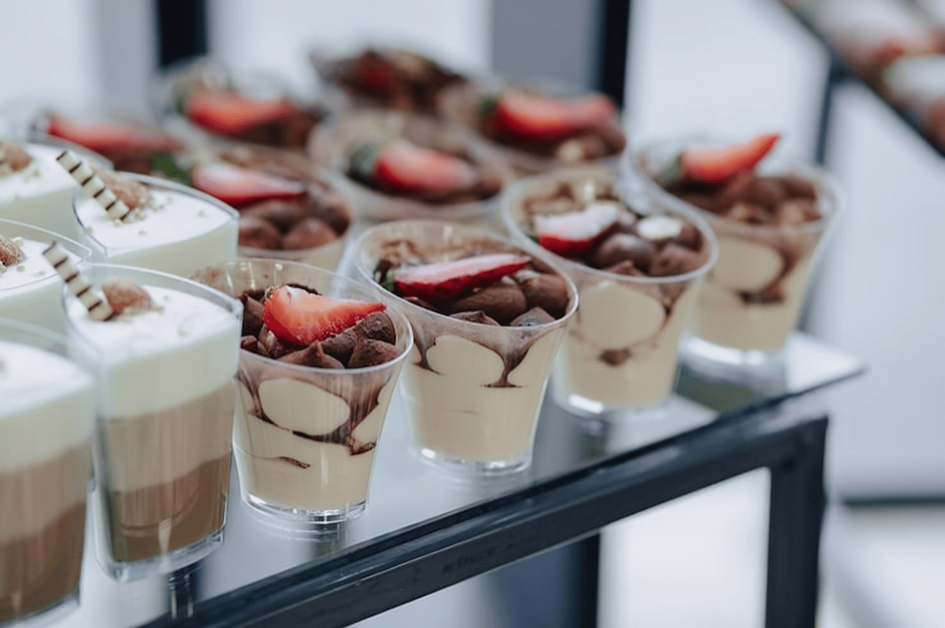 an abstract photo of a curved building with a blue sky in the background