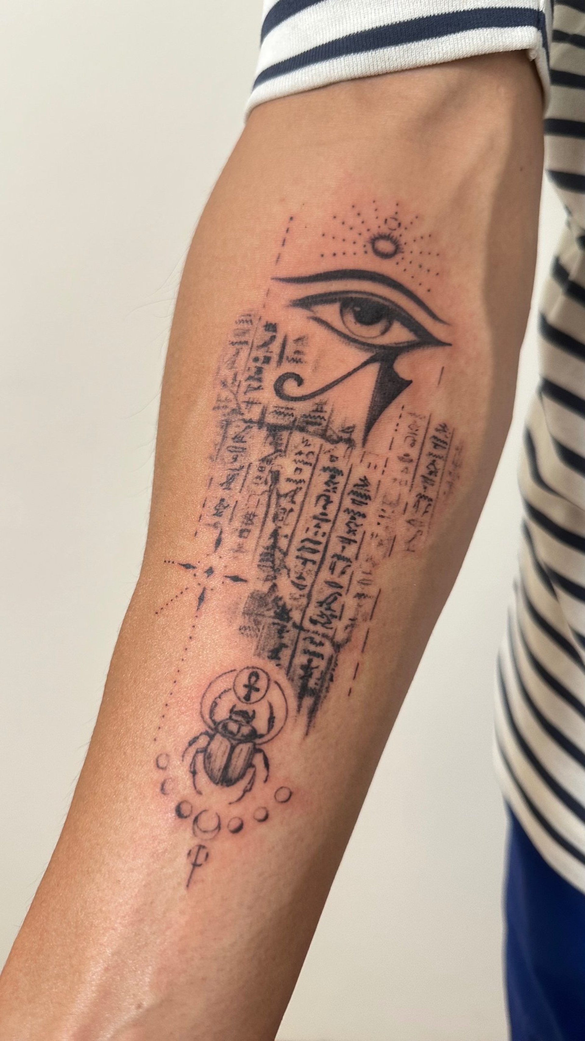 an abstract photo of a curved building with a blue sky in the background