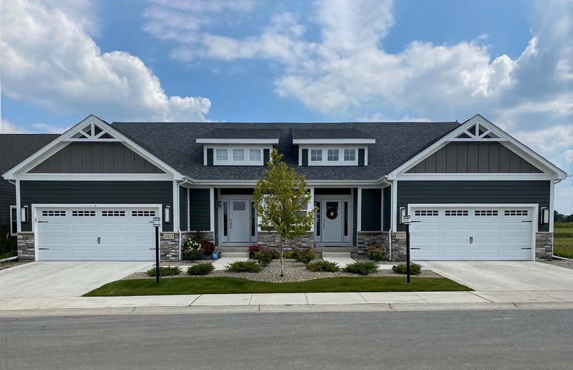woman wearing yellow long-sleeved dress under white clouds and blue sky during daytime